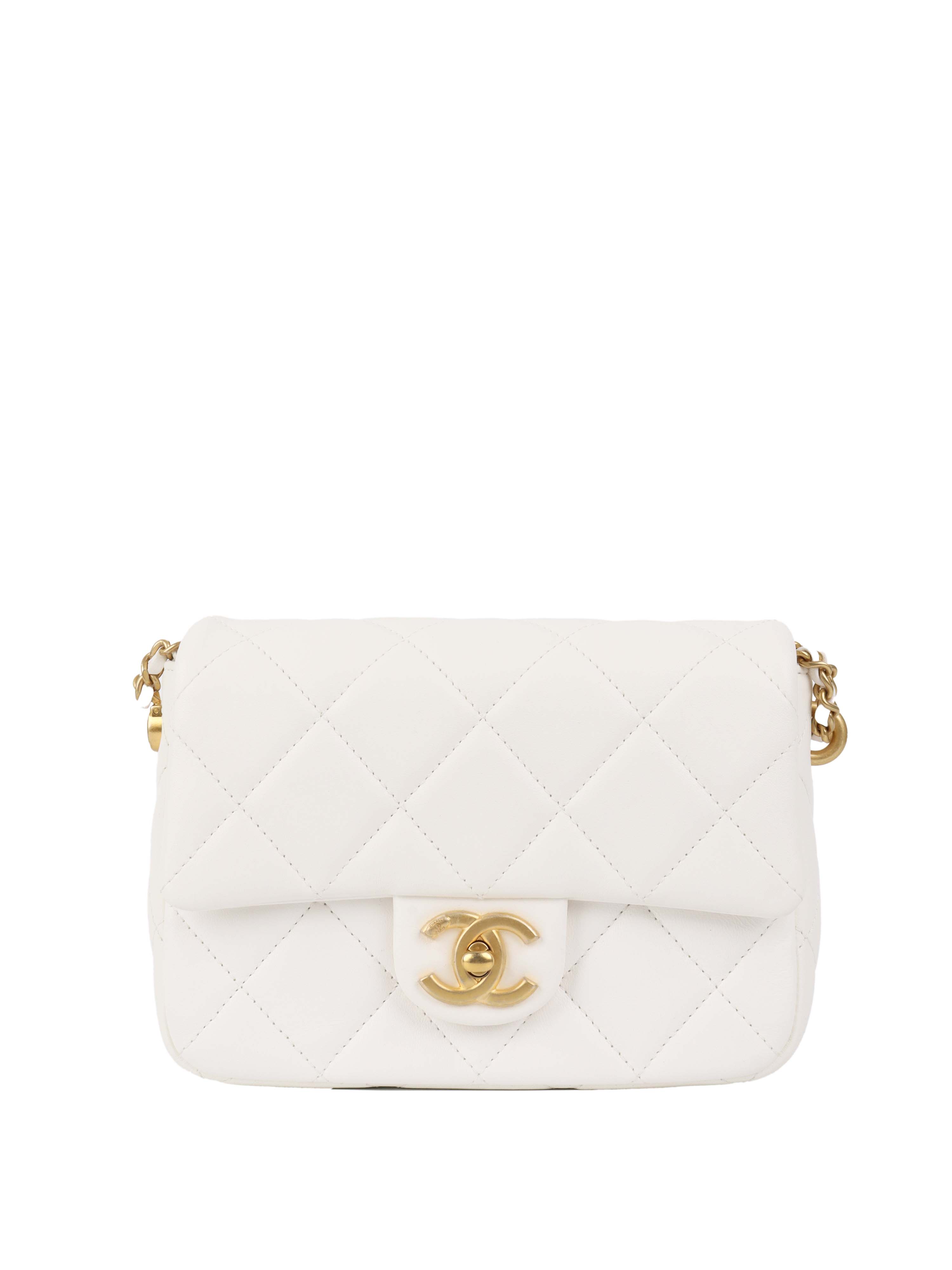 Chanel White and Pearl Chain Flap Bag.