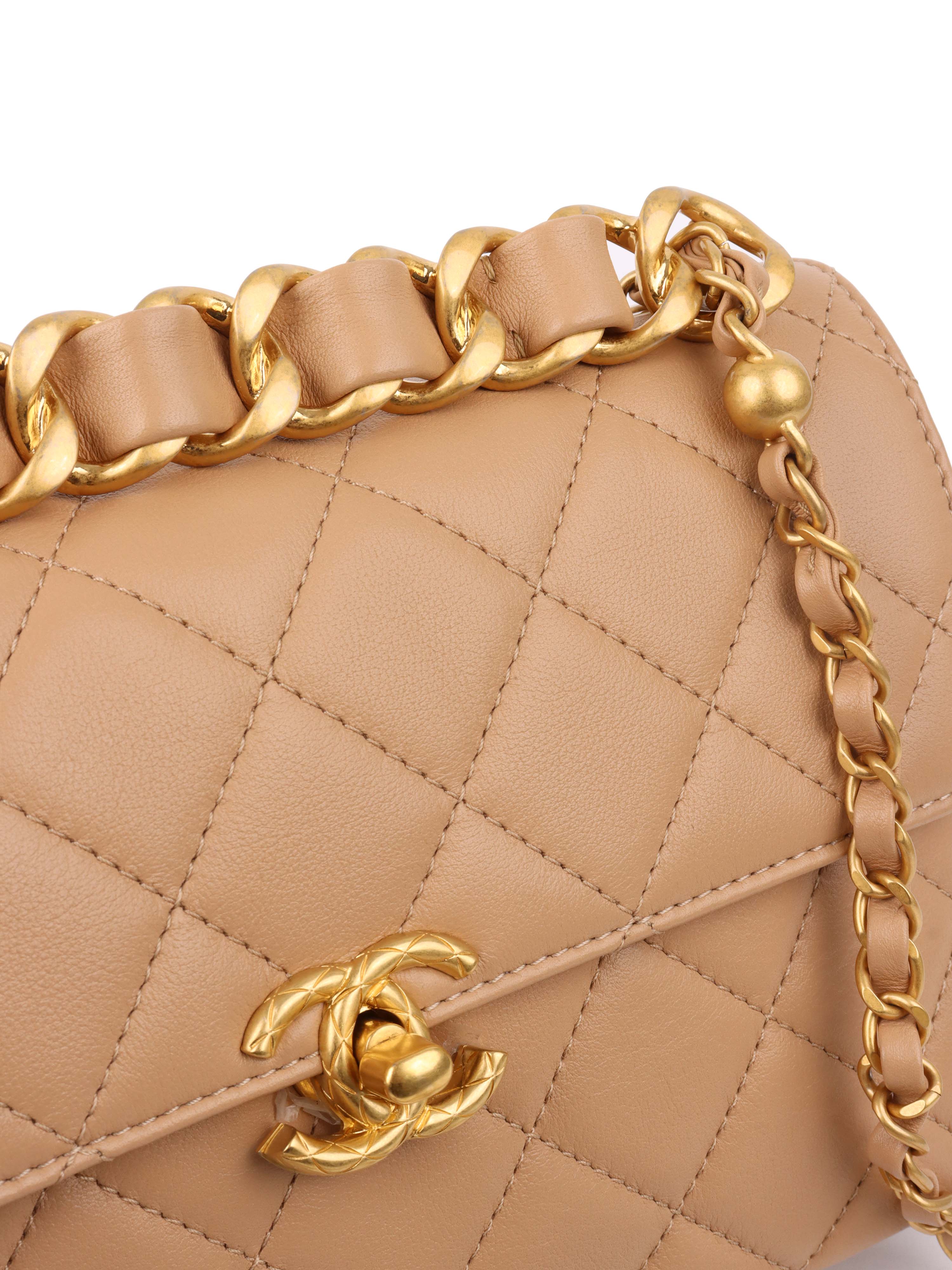 Chanel Beige Woven Chain Link Handle Flap Bag.