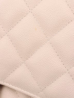 Chanel Jumbo Ivory Caviar Classic Flap.