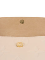 Louis Vuitton Cream Monogram Wallet on Chain Ivy.