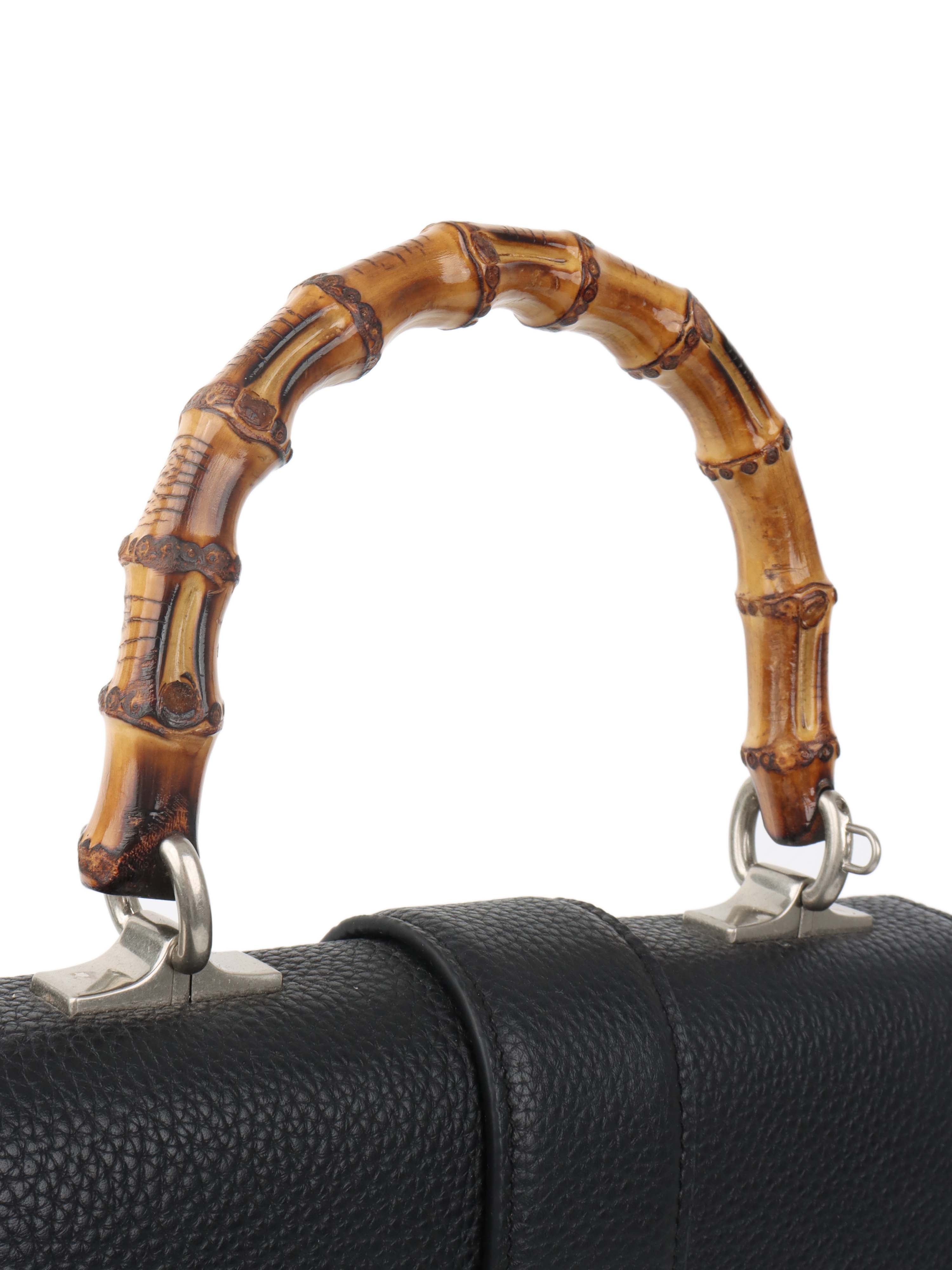 Gucci Black Dionysus bag with bamboo handle.