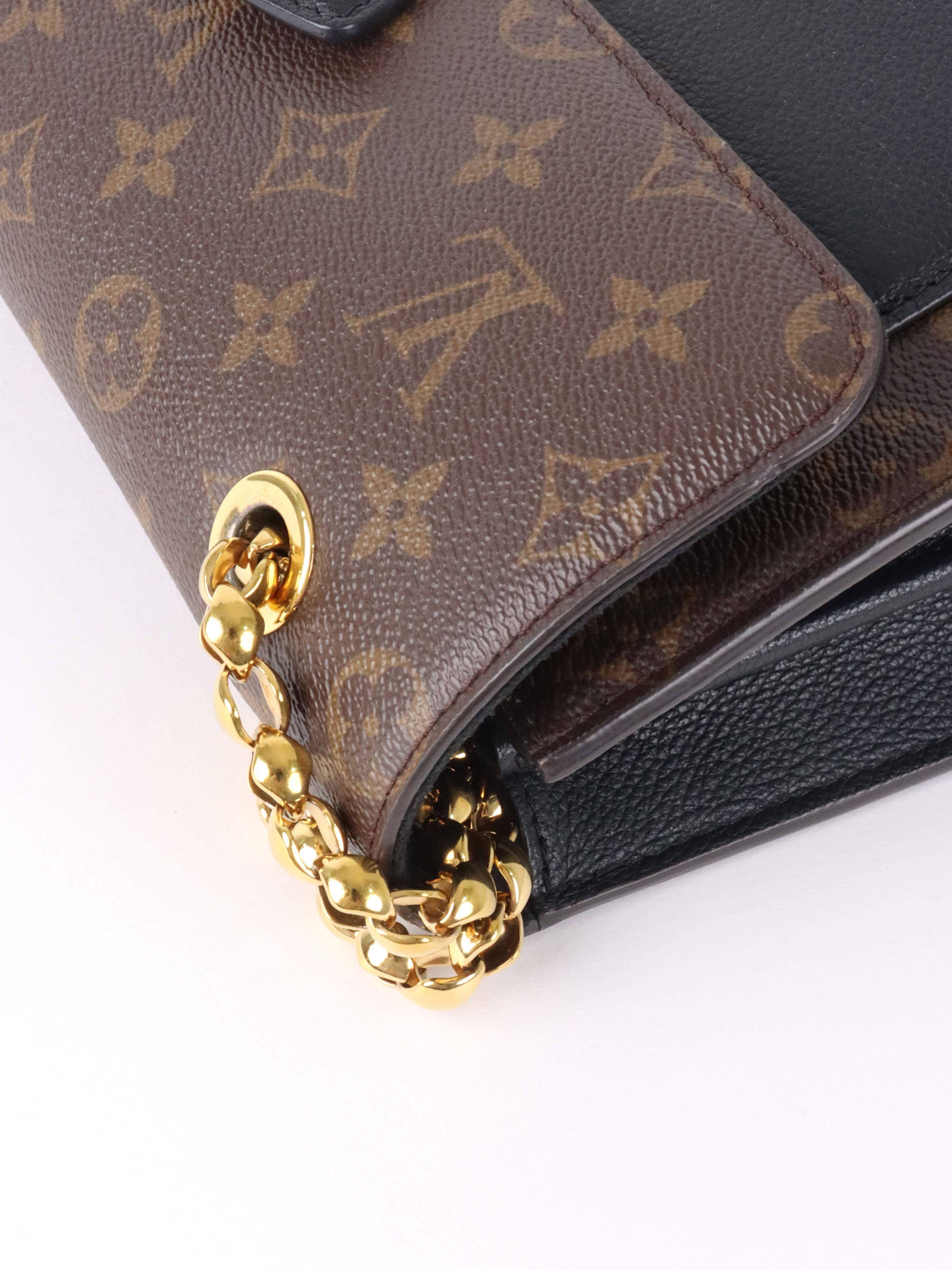 Louis Vuitton Black Victoire MNG MM Bag.