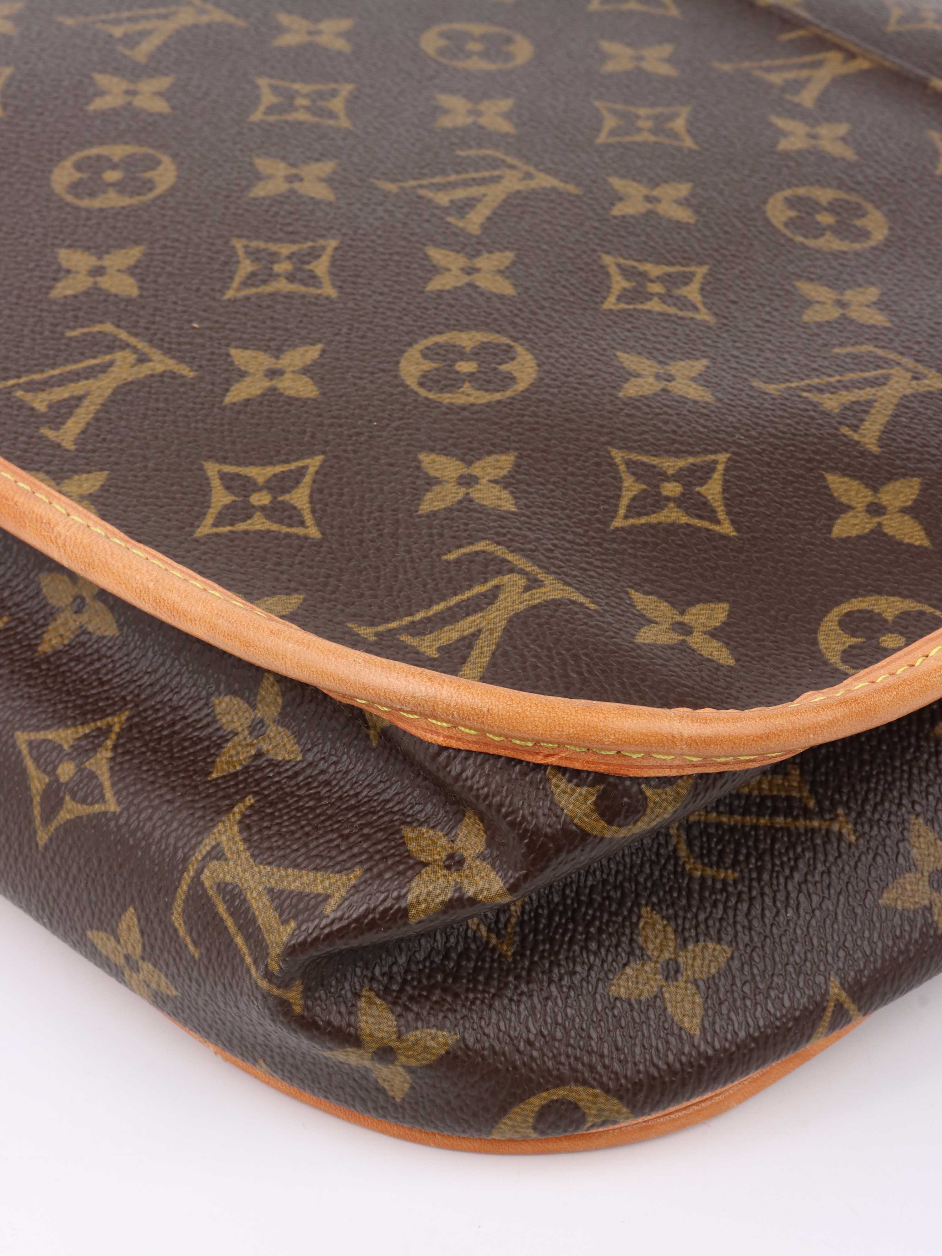 Louis Vuitton Monogram Messenger Bag.