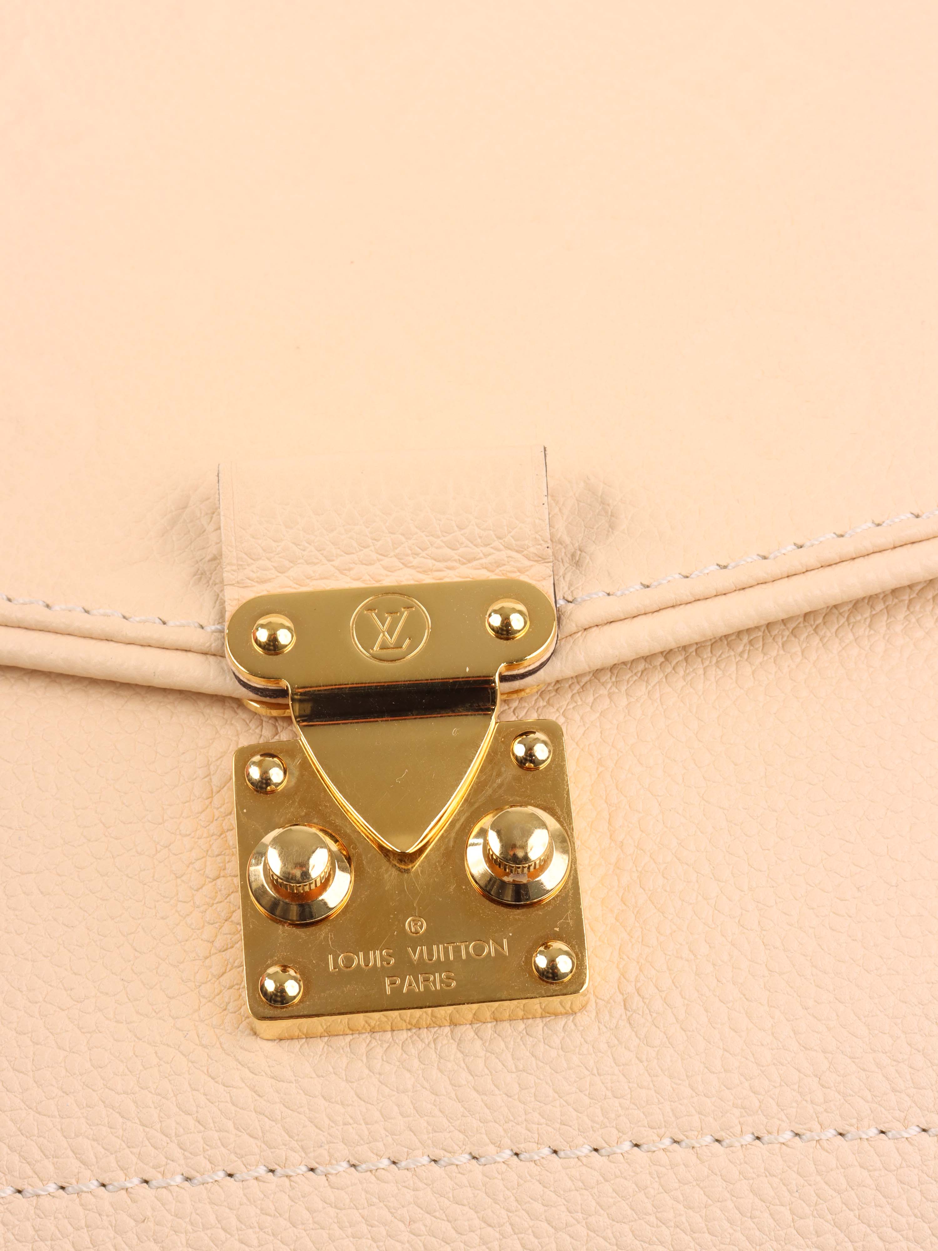 Louis Vuitton Cream Monogram Empreinte Saint Germain PM Bag.