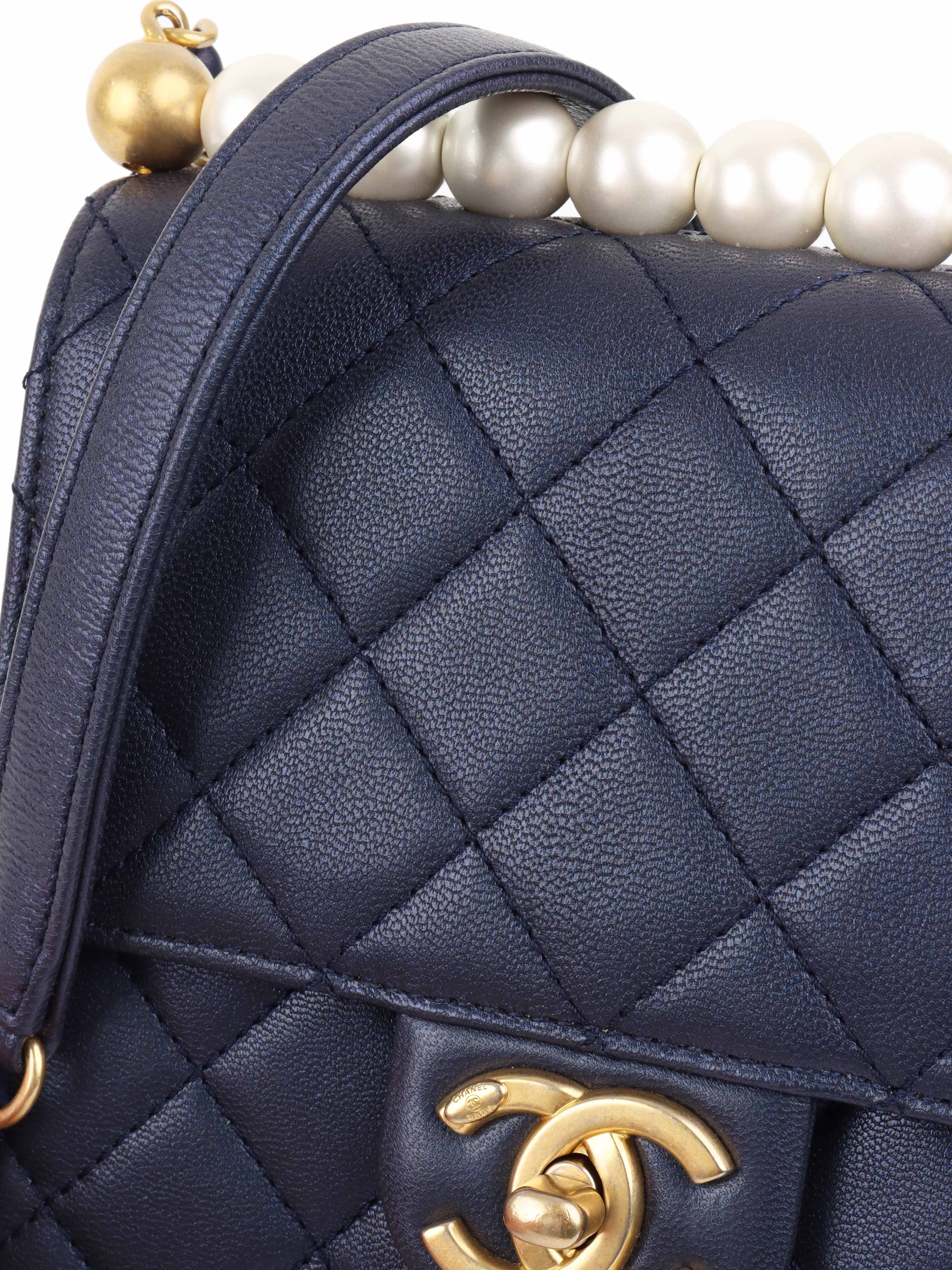 Chanel Navy Iridescent Flap Bag with Pearls.