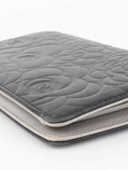 Chanel Black Camellia Wallet.