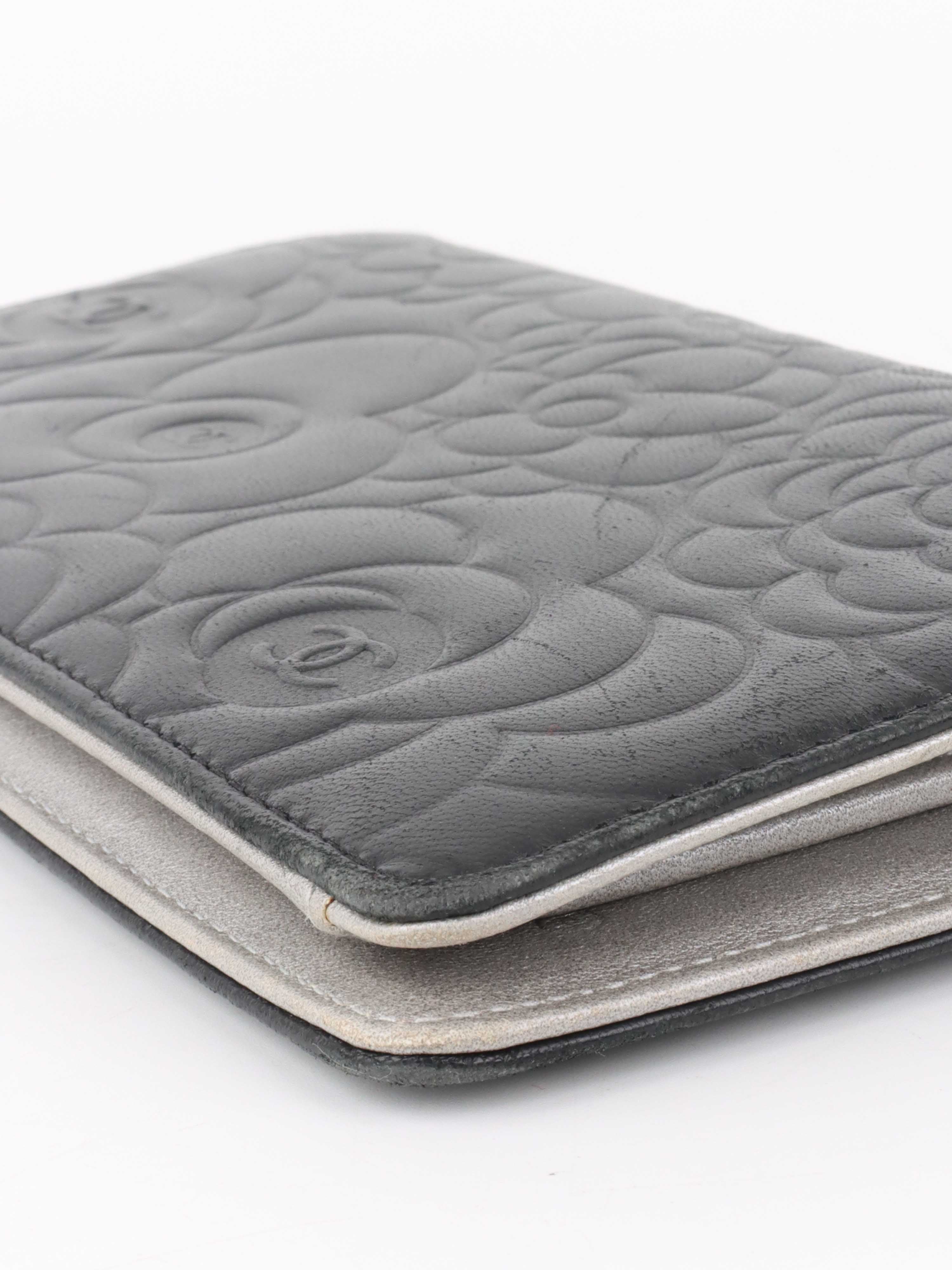 Chanel Black Camellia Wallet.