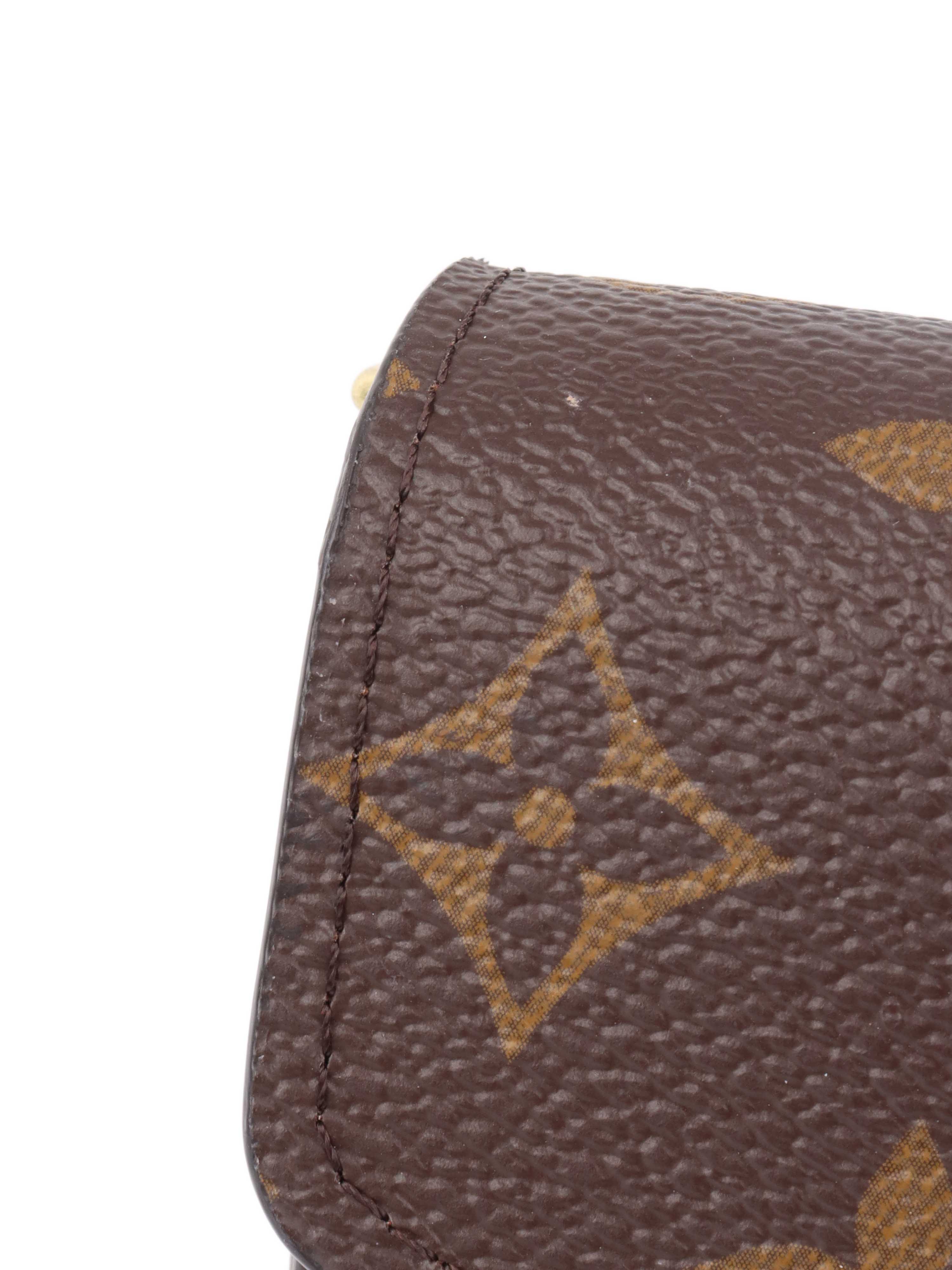 Louis Vuitton Monogram Sarah Wallet.