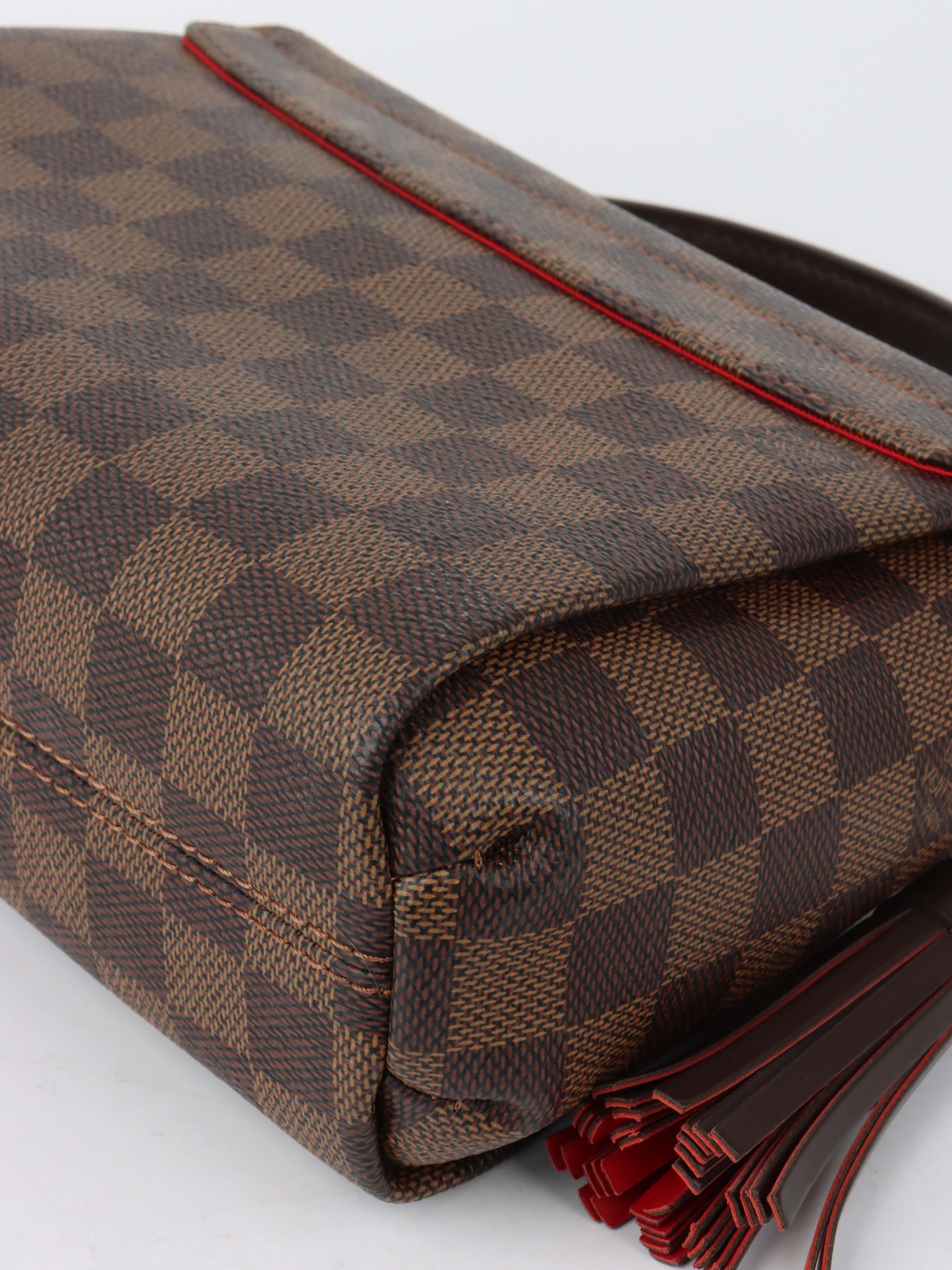 Louis vuitton Damier Ebene Croisette Bag.