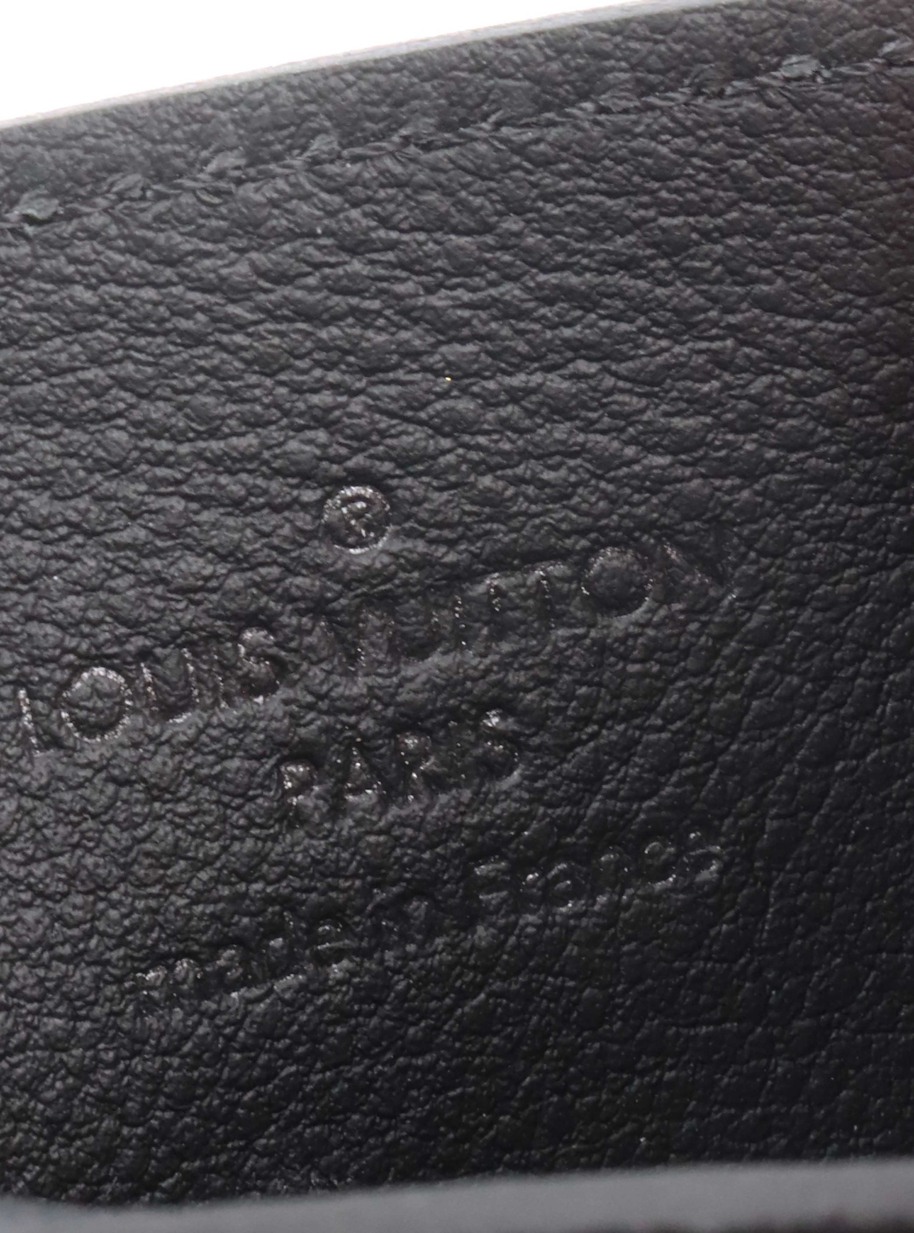 Louis Vuitton Black Double Card Holder.