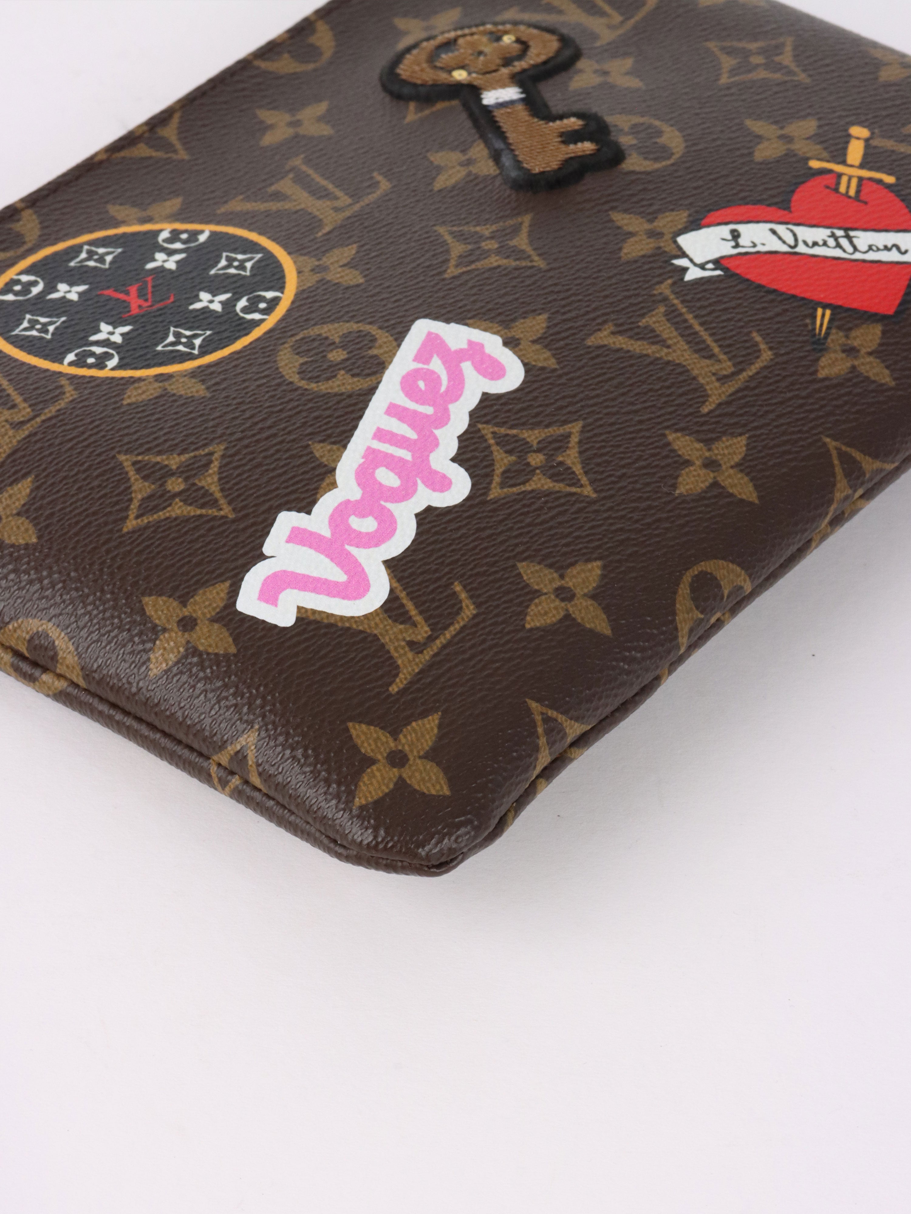 Louis Vuitton Limited Edition Monogram Patches City Pouch Bag.