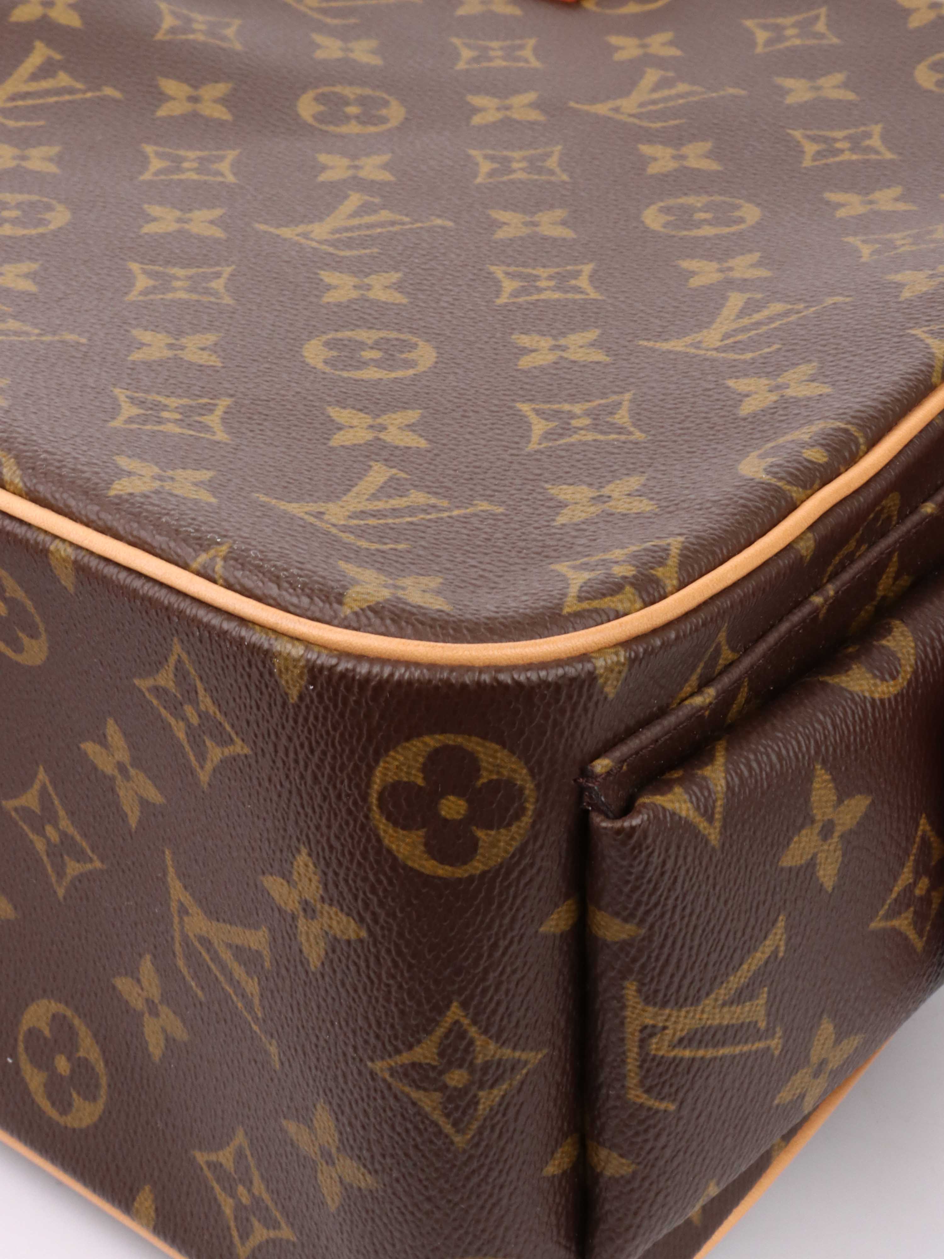 Louis Vuitton Monogram Excentri-Cite Handbag.