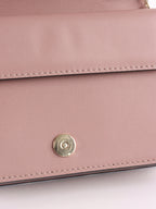 Valentino Garavani Pink Rockstud Cross Body Bag.