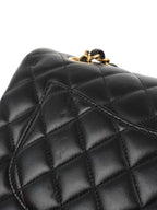 Chanel Small Black Lambskin Classic Flap.
