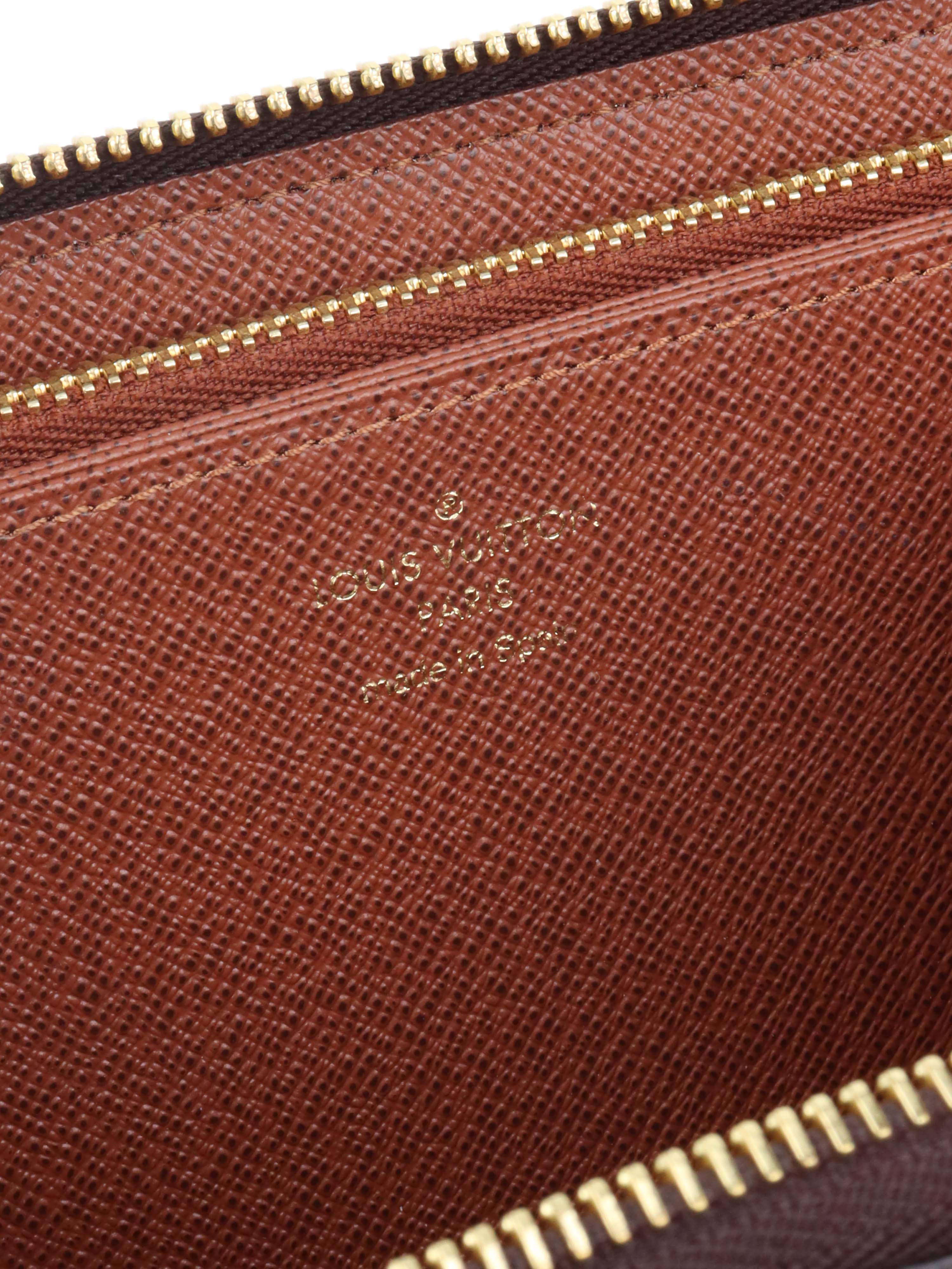 Louis Vuitton Monogram Zippy Long Wallet.
