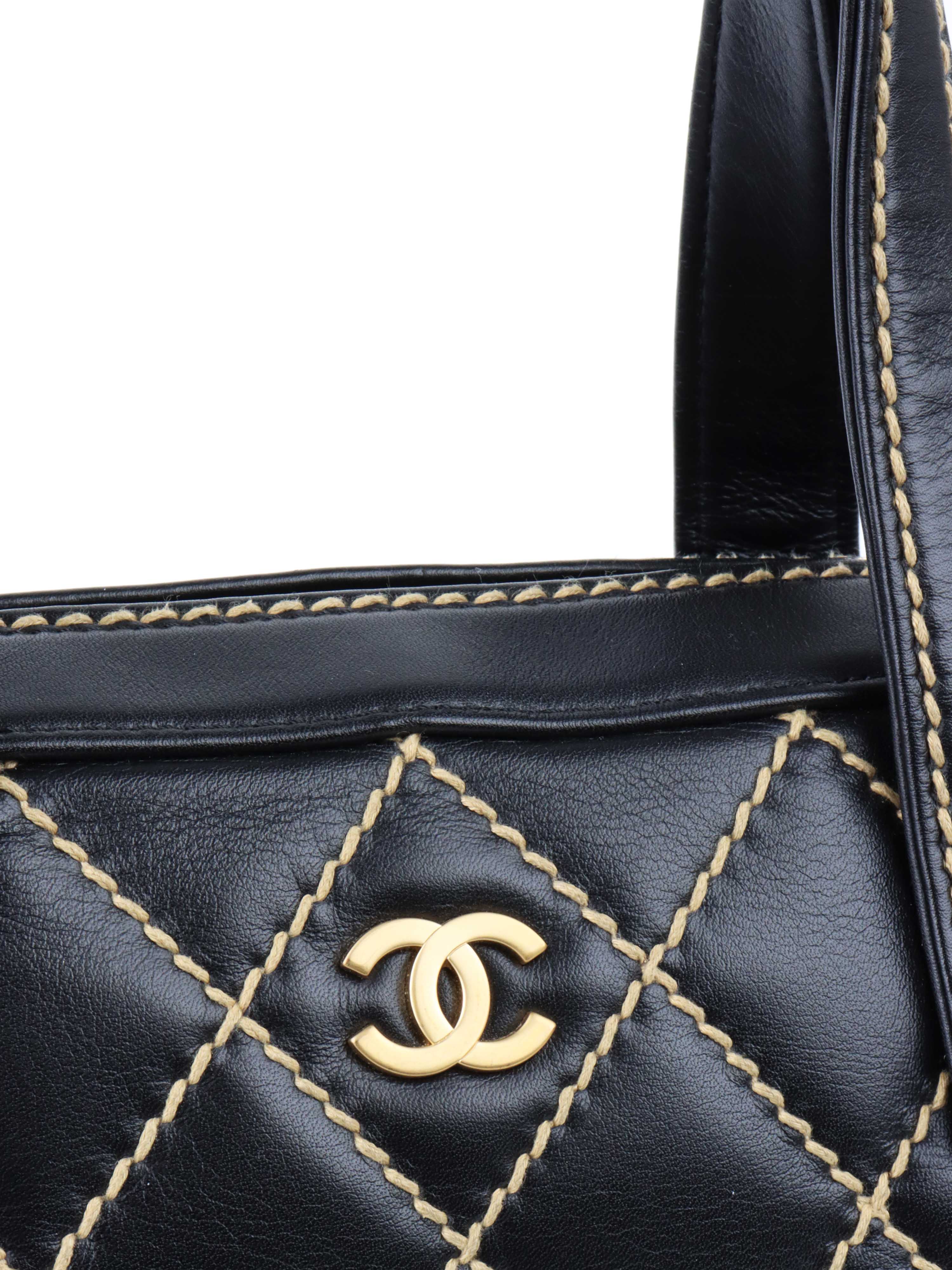 Chanel Black with Gold Trim Bowling Bag.