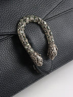 Gucci Small Black Dionysus Bag.