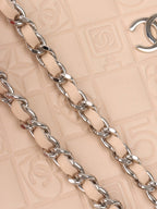 Chanel Beige Lucky Embossed Symbols Pochette with Wristlet Chain.