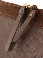 Louis Vuitton Terre Empreinte Monogram Audacieuse PM Bag.