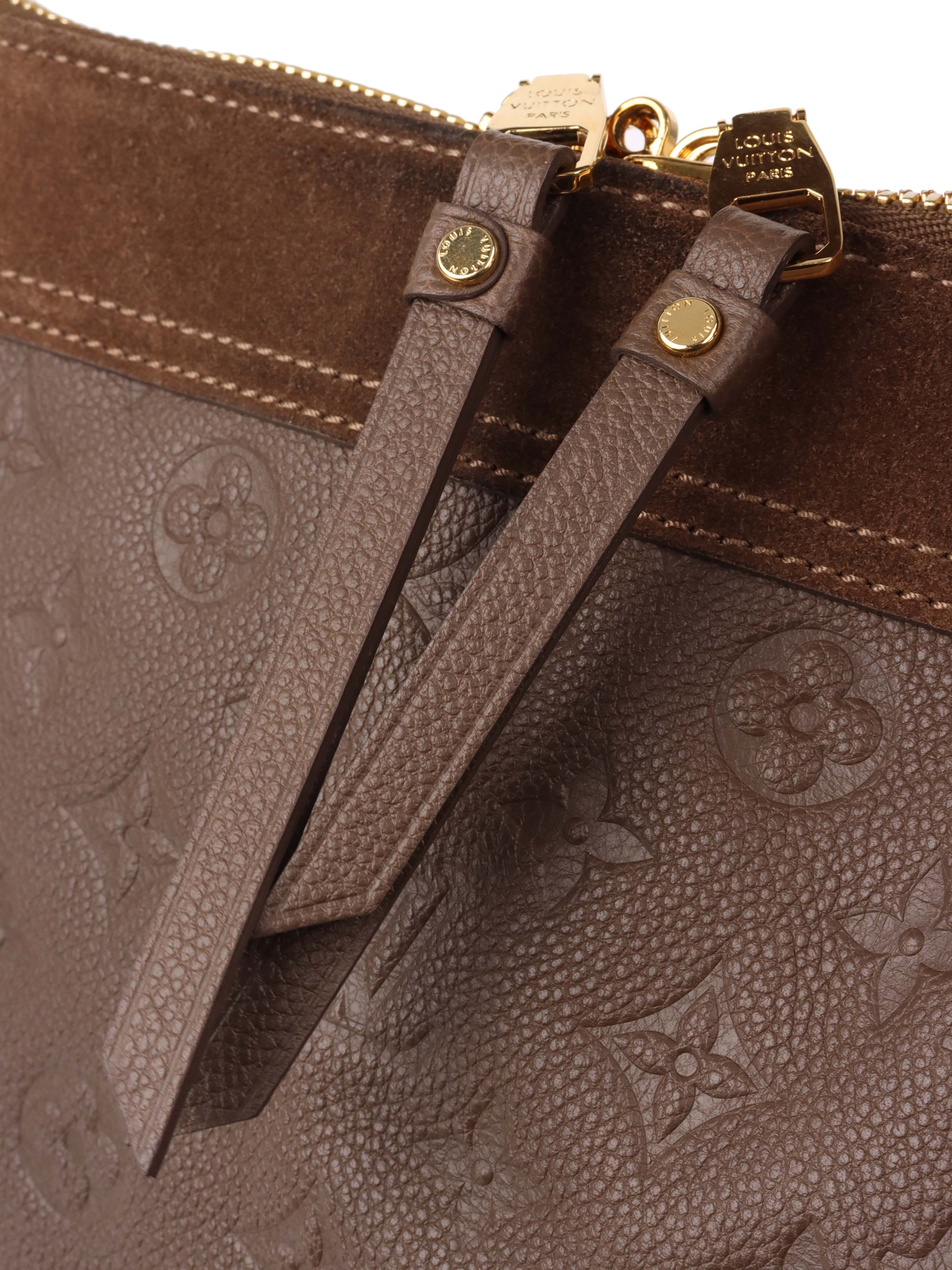 Louis Vuitton Terre Empreinte Monogram Audacieuse PM Bag.