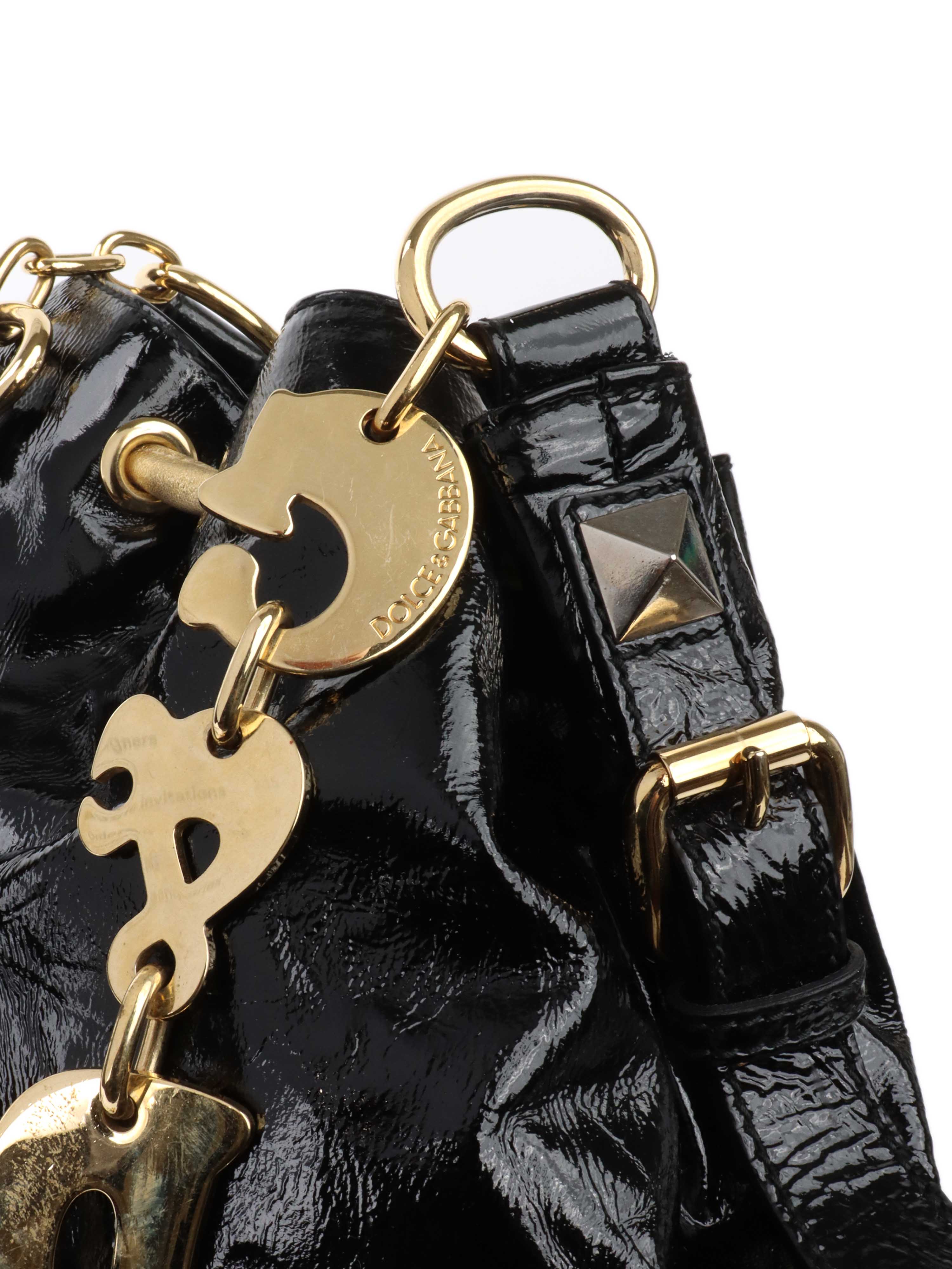 Dolce & Gabbana Black & Gold Patent Hobo Bag.