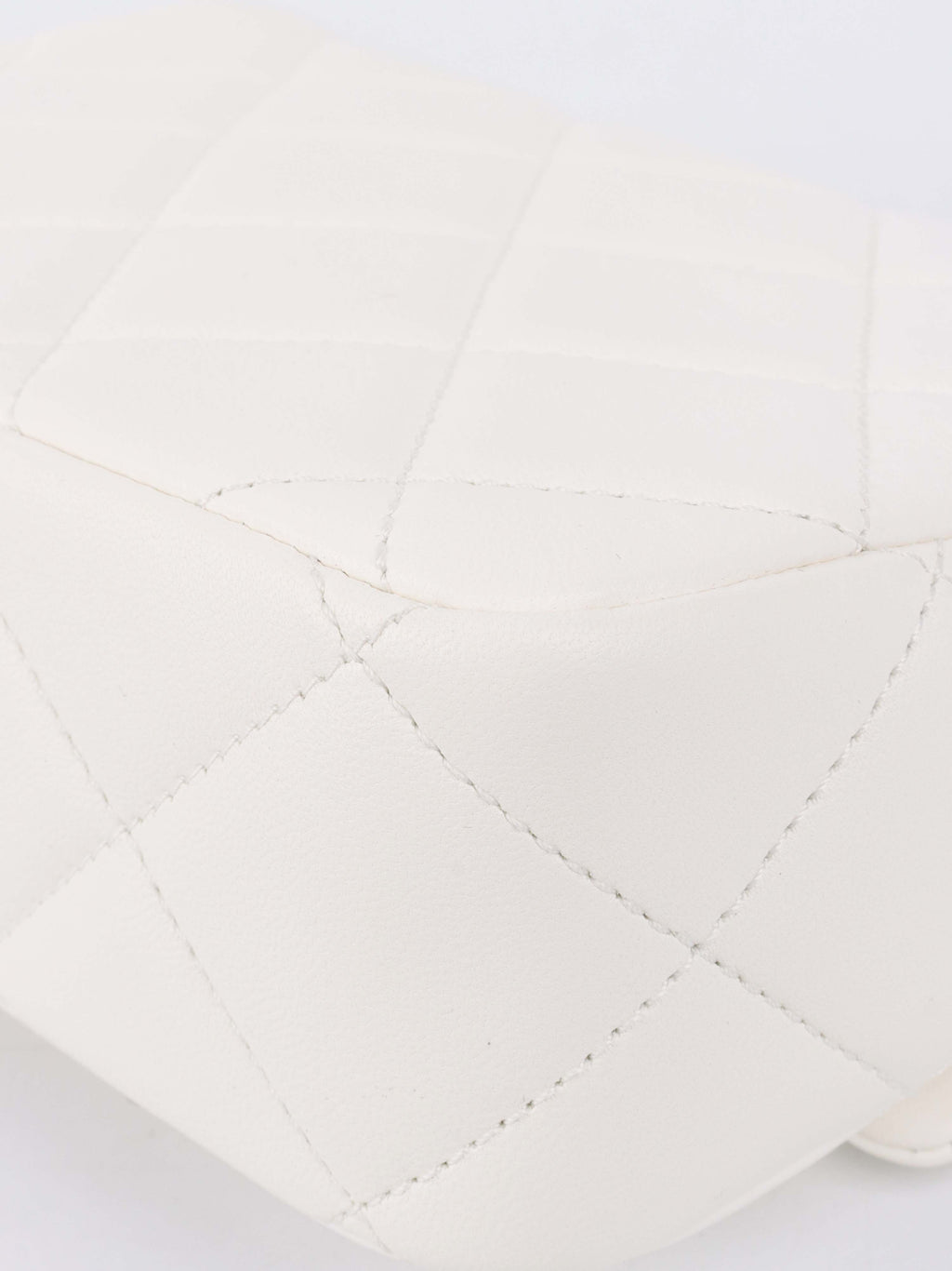 Chanel White and Pearl Chain Flap Bag.