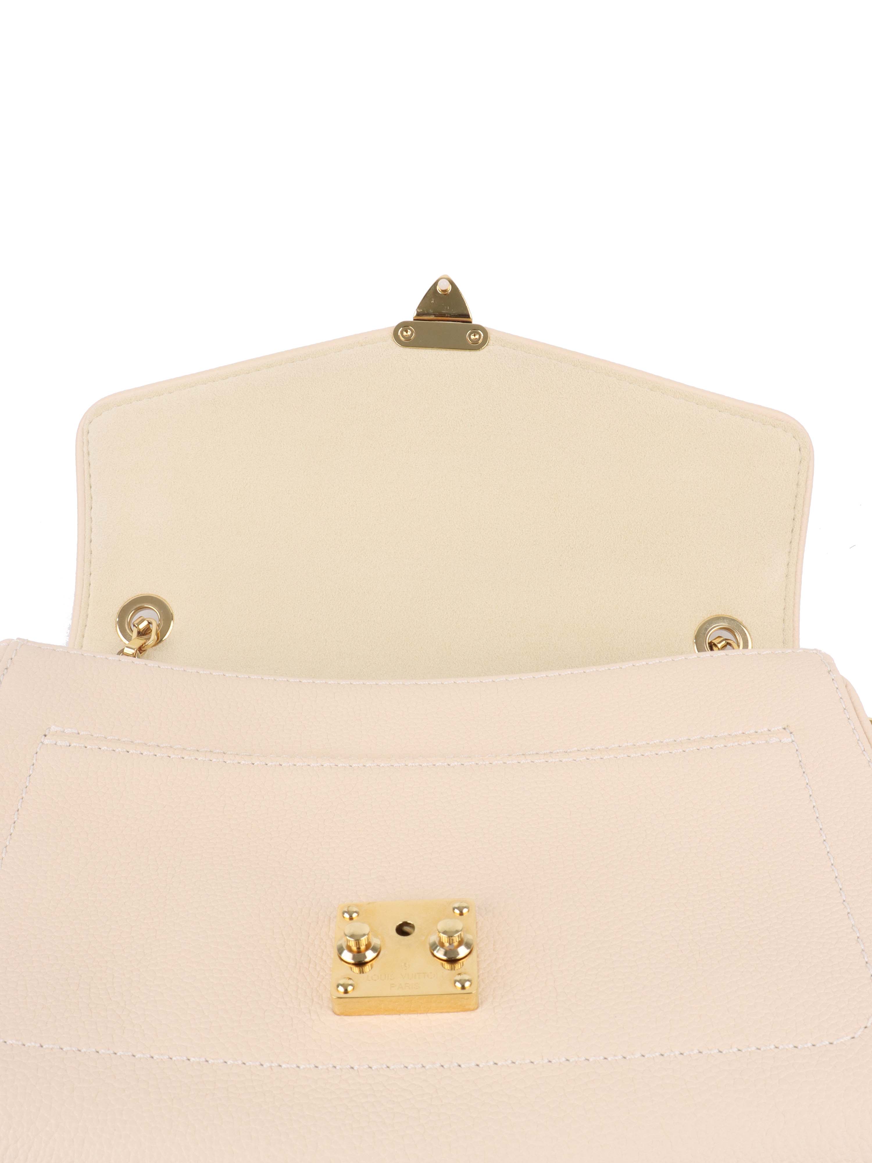Louis Vuitton Cream Monogram Empreinte Saint Germain PM Bag.