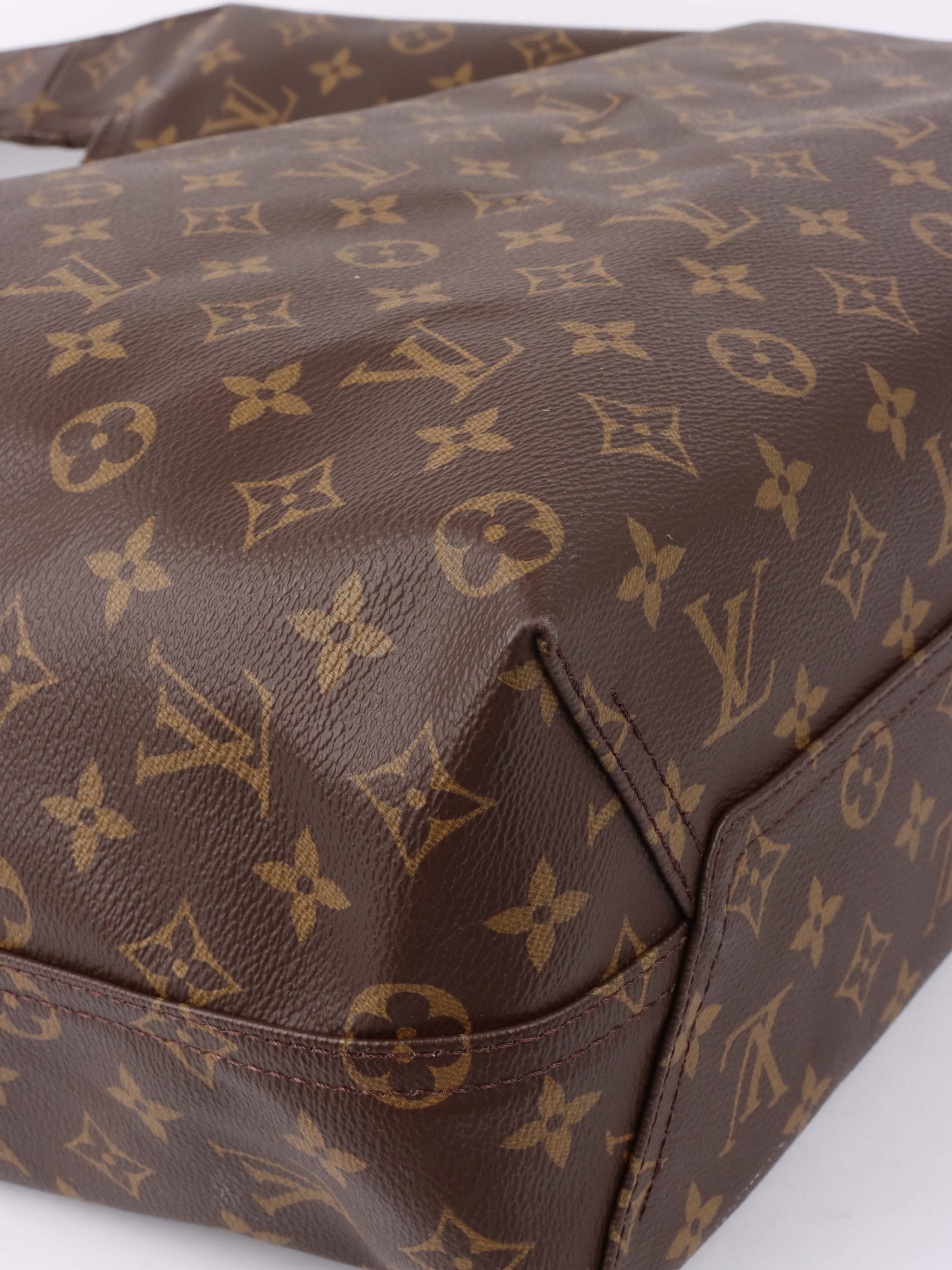 Louis Vuitton Atlantis GM Bag.
