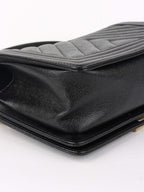Chanel Black Chevron Caviar Medium Boy Bag.