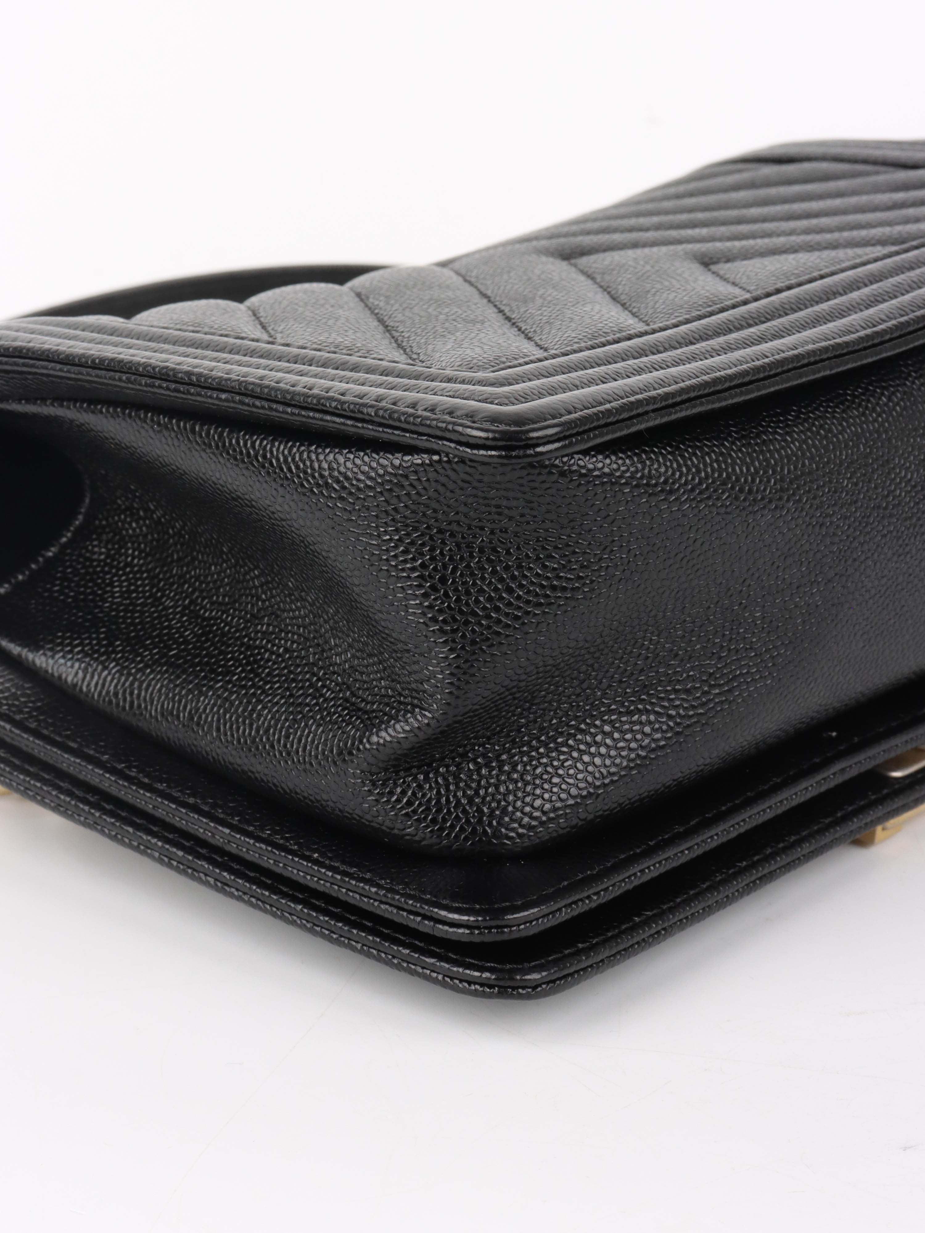 Chanel Black Chevron Caviar Medium Boy Bag.