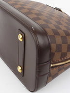 Louis Vuitton Damier Ebene Alma PM.
