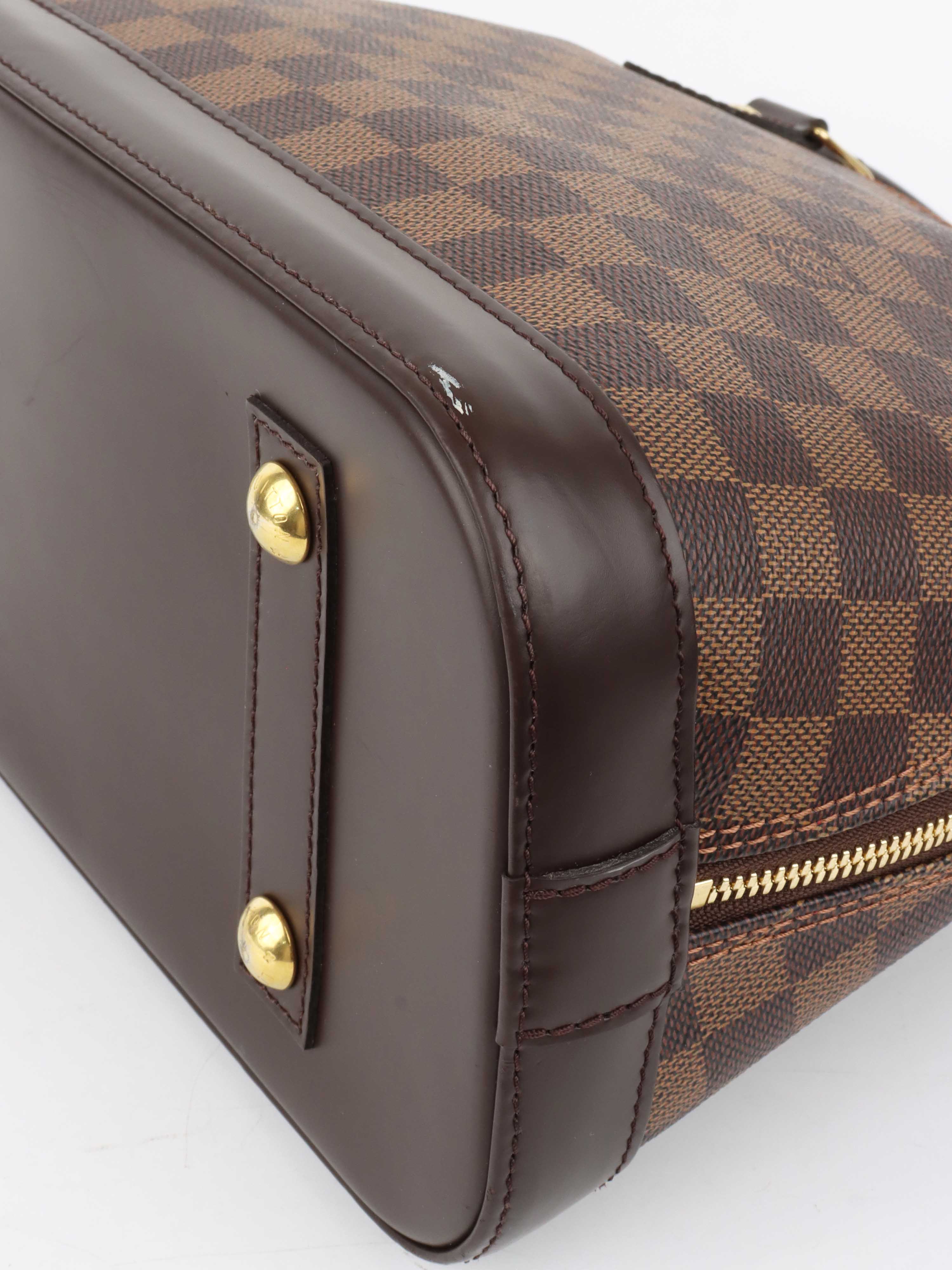 Louis Vuitton Damier Ebene Alma PM.