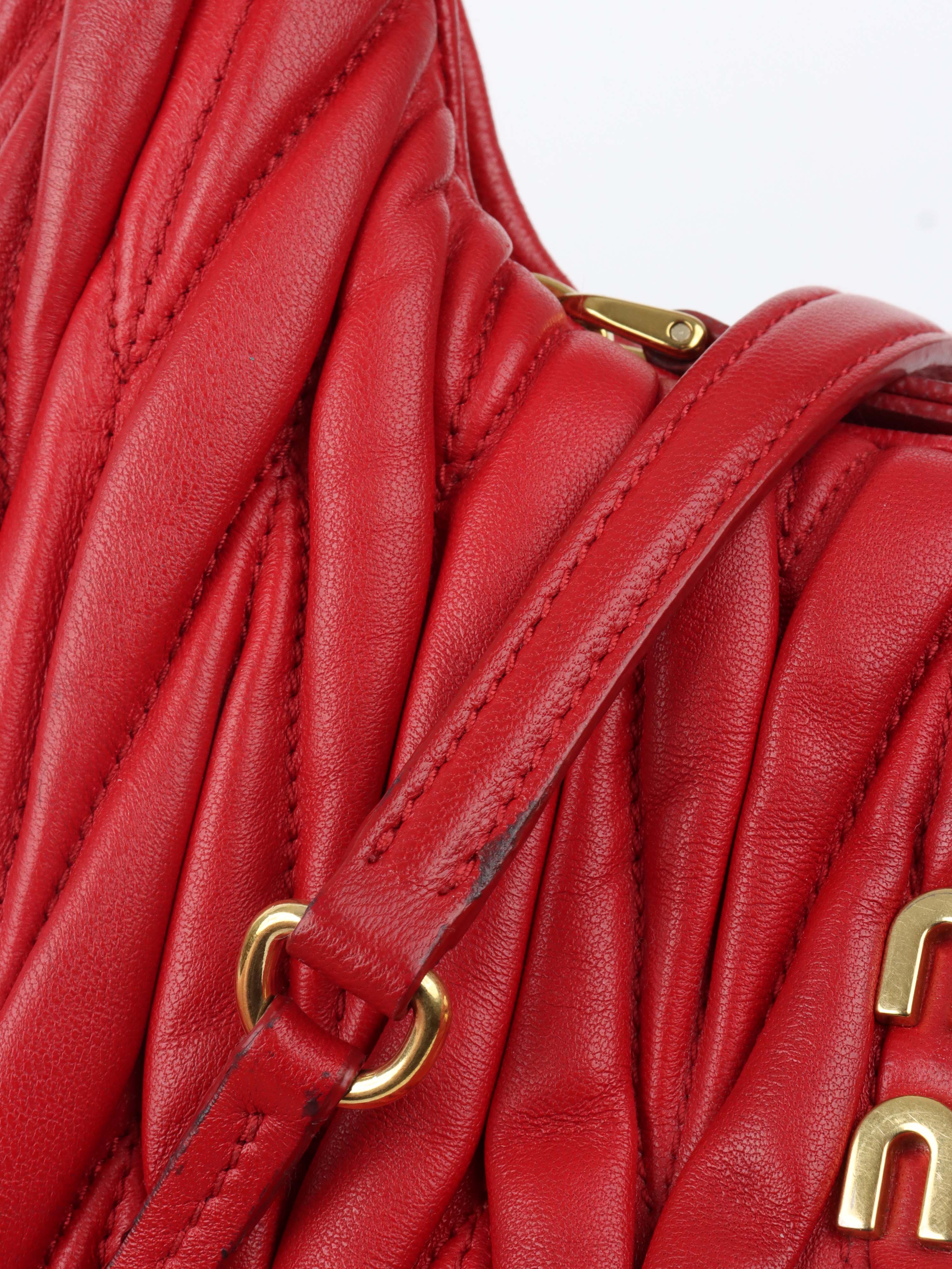Miu Miu Small Red Wander Matelassé Bag.