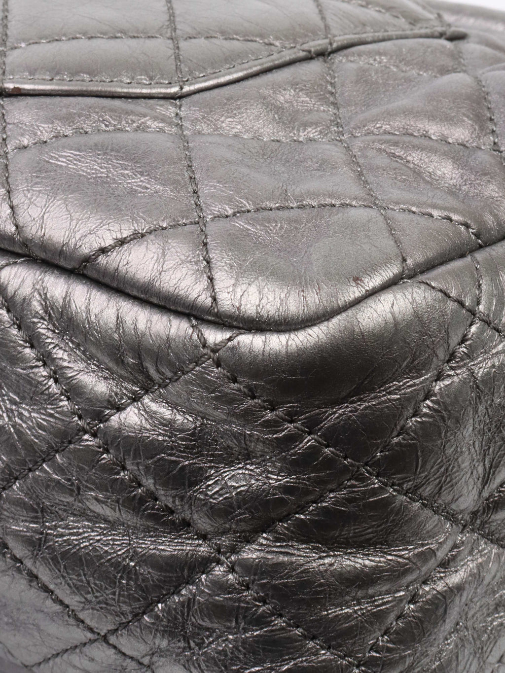 Chanel Metallic Silver 2.55 Reissue Camera Bag.