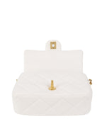 Chanel White and Pearl Chain Flap Bag.