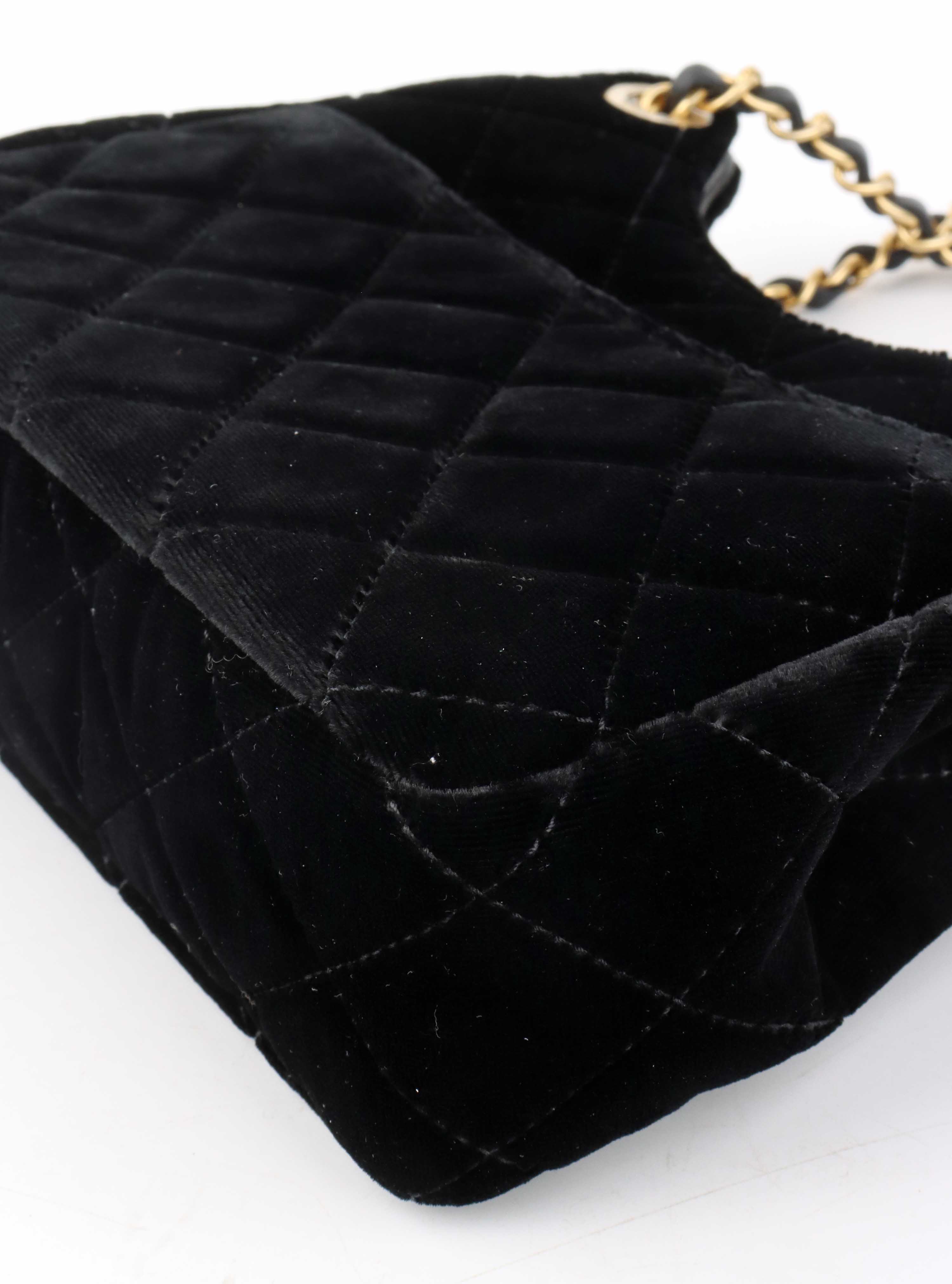 Chanel Black Small Quilted Velvet Wavy CC Hobo Bag.
