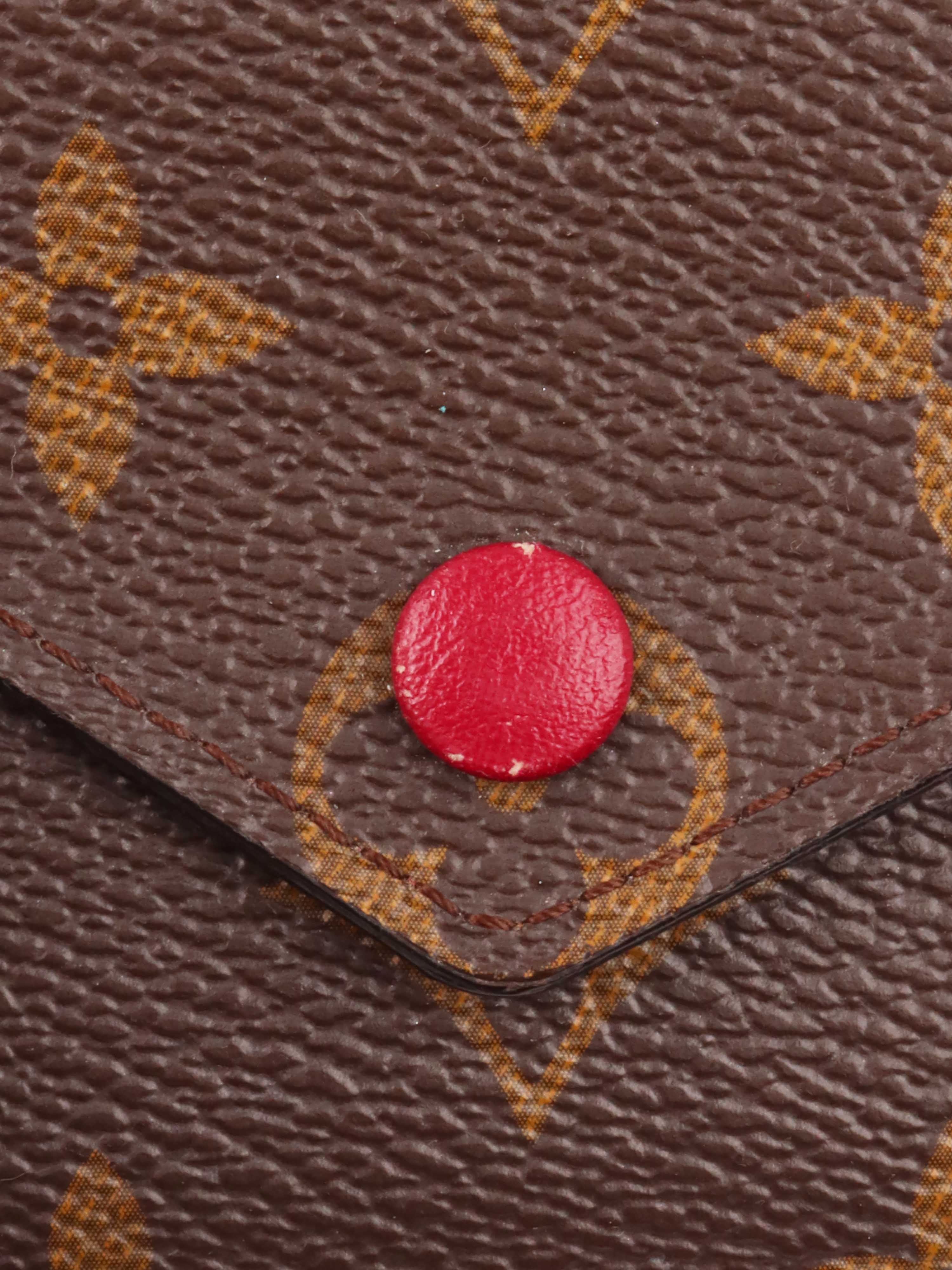 Louis Vuitton Monogram Victorine Wallet.