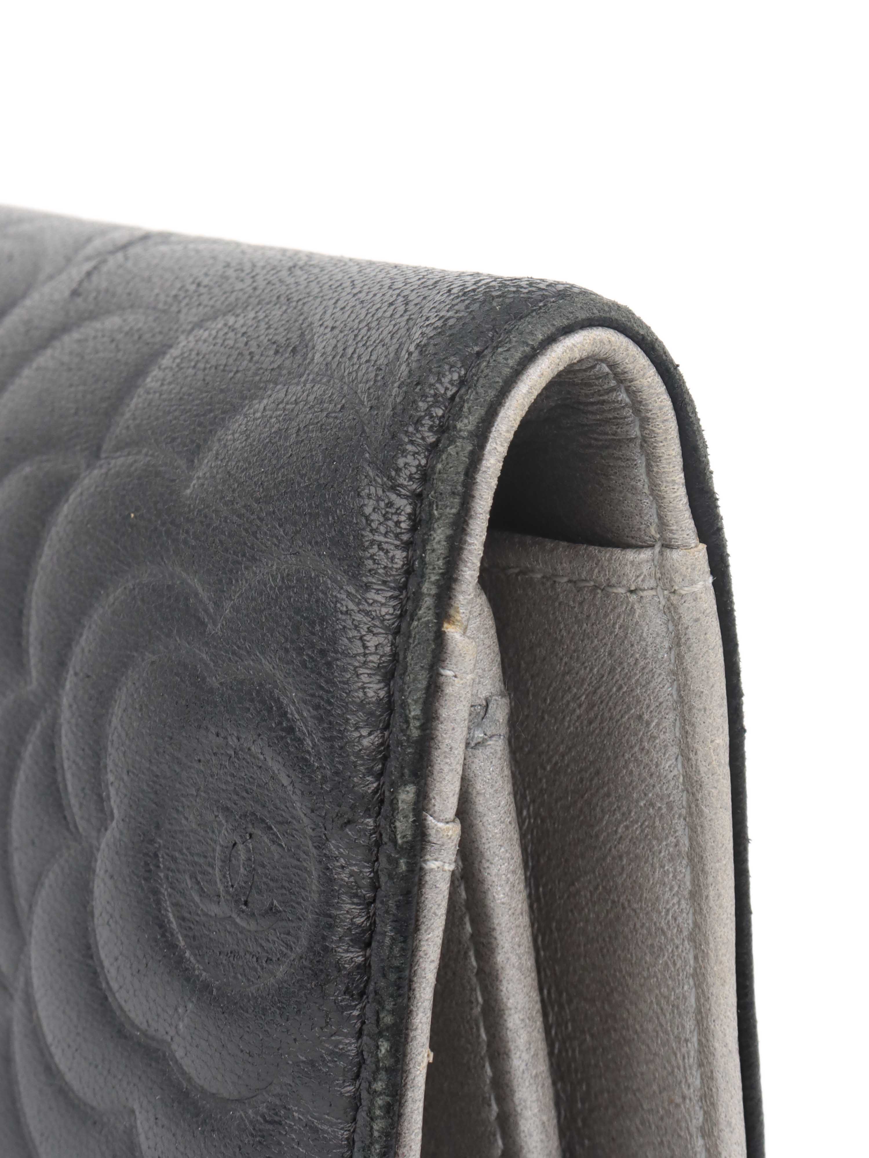 Chanel Black Camellia Wallet.