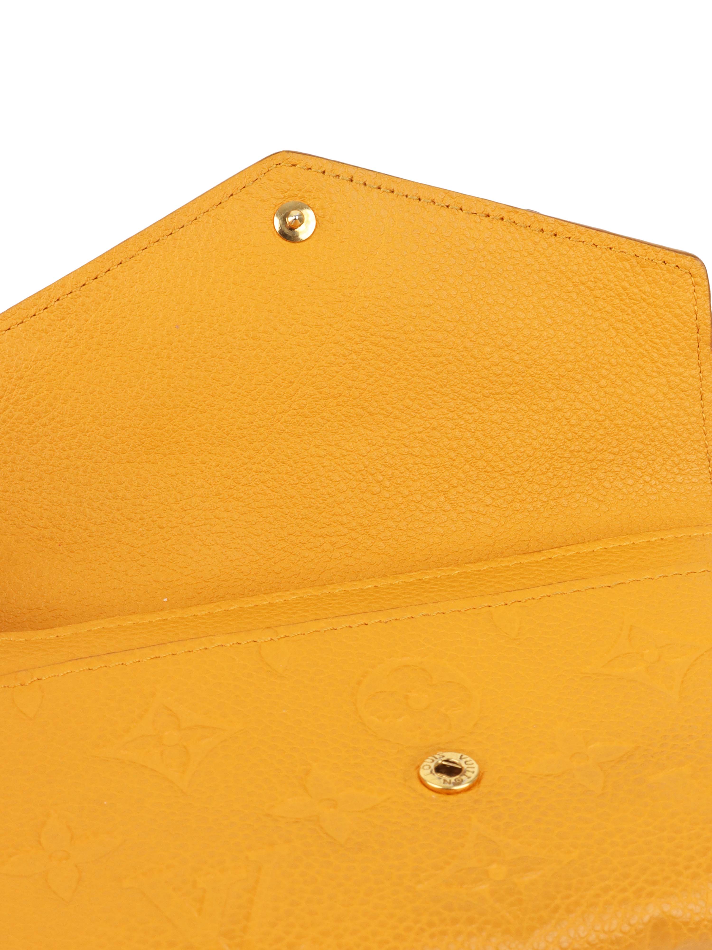 Louis Vuitton Saffran Empreinte Leather Compact Wallet.