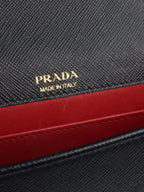 Prada Black Mini Saffiano Leather Bag.