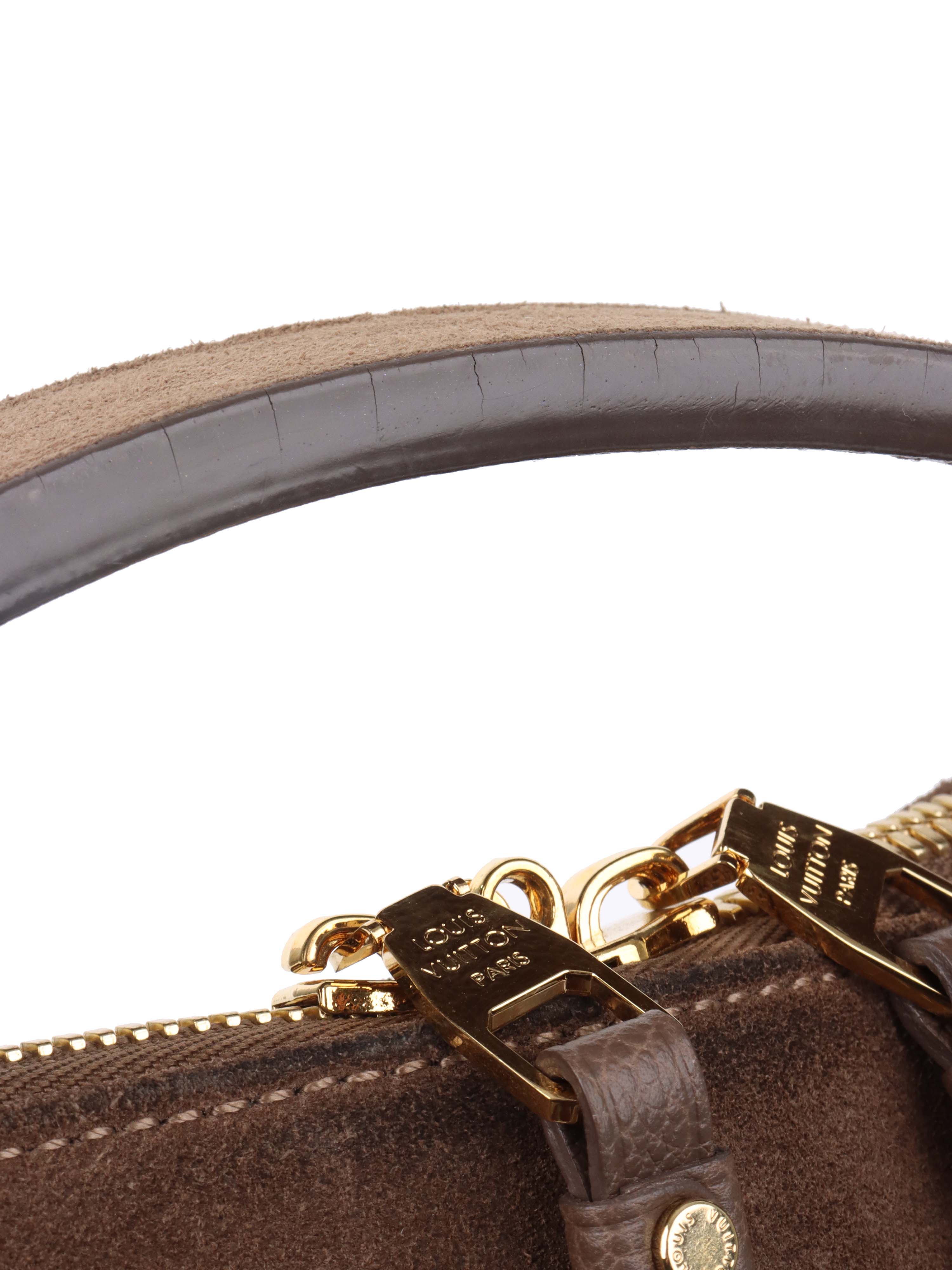 Louis Vuitton Terre Empreinte Monogram Audacieuse PM Bag.