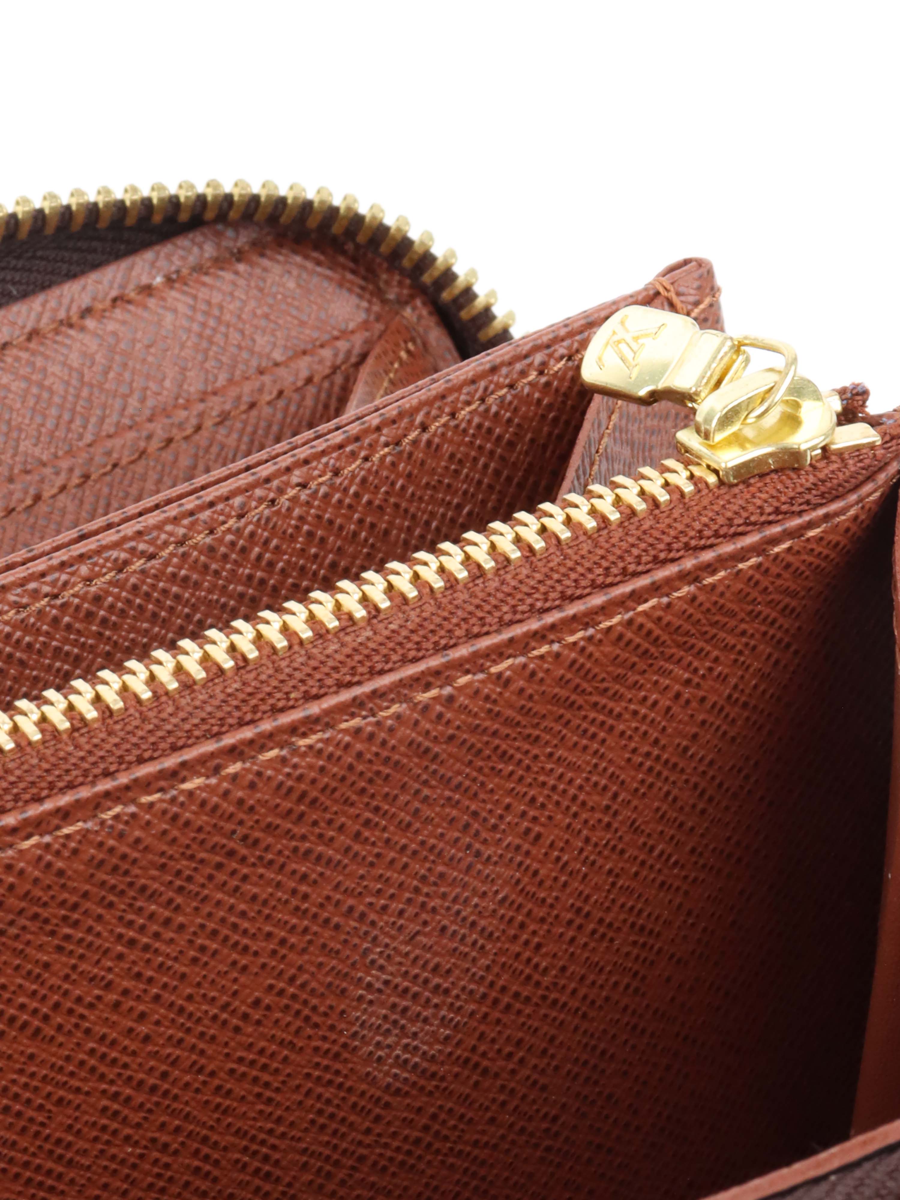 Louis Vuitton Monogram Zippy Long Wallet.