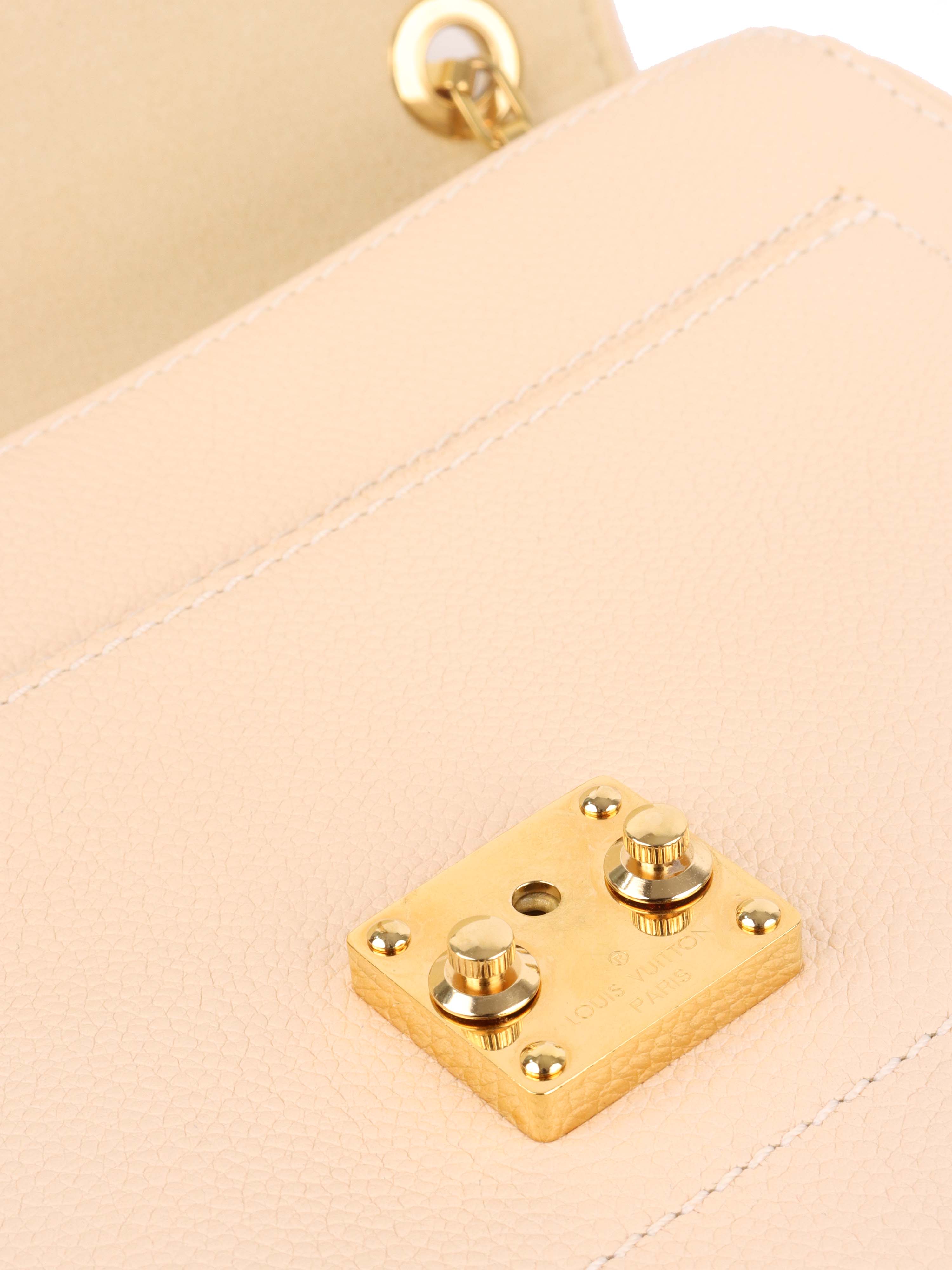 Louis Vuitton Cream Monogram Empreinte Saint Germain PM Bag.