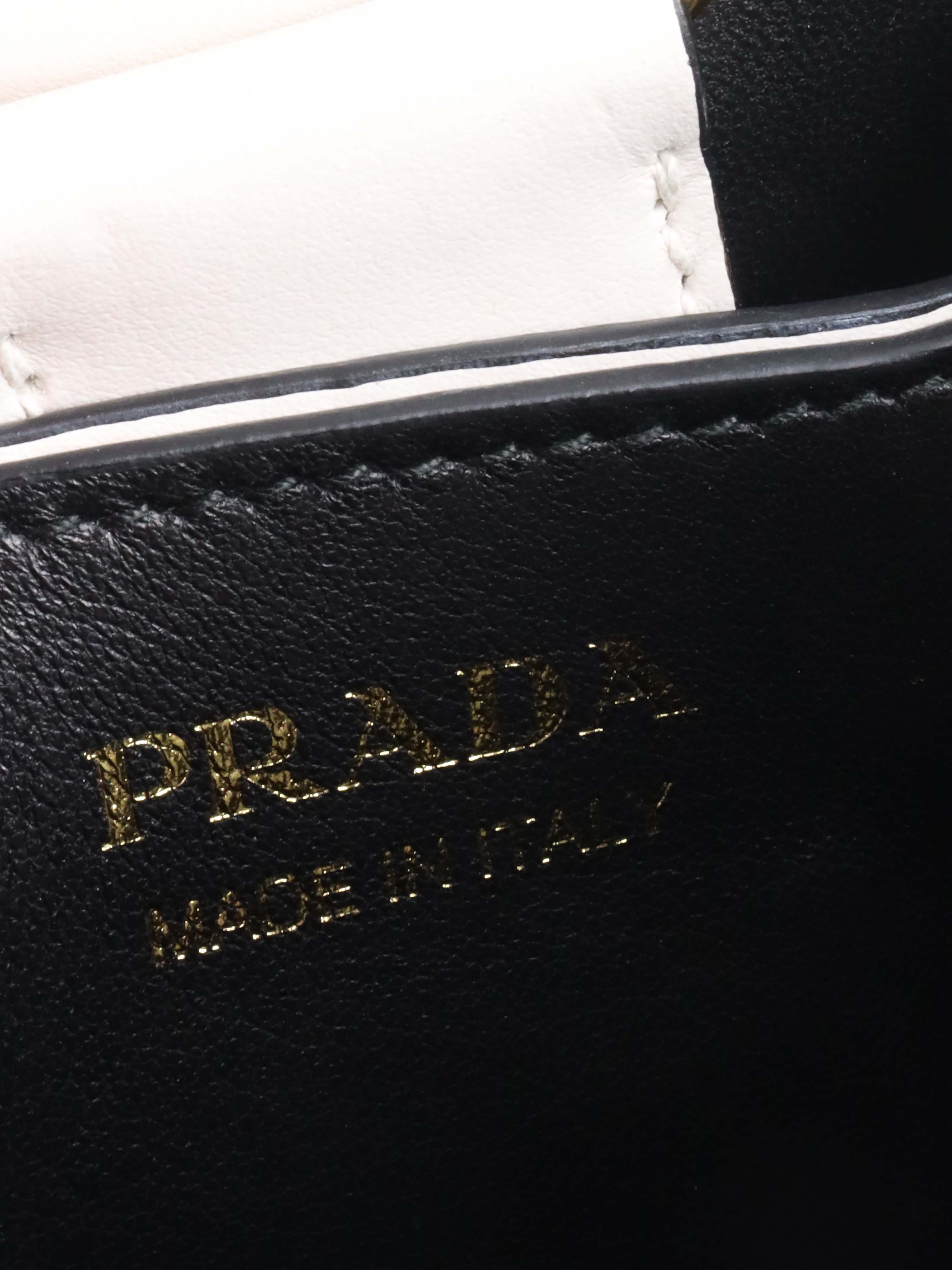 Prada Small Saffiano White Panier Bag.