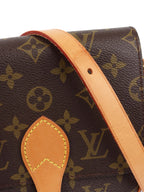 Louis Vuitton Monogram Cartouchiere PM Bag.
