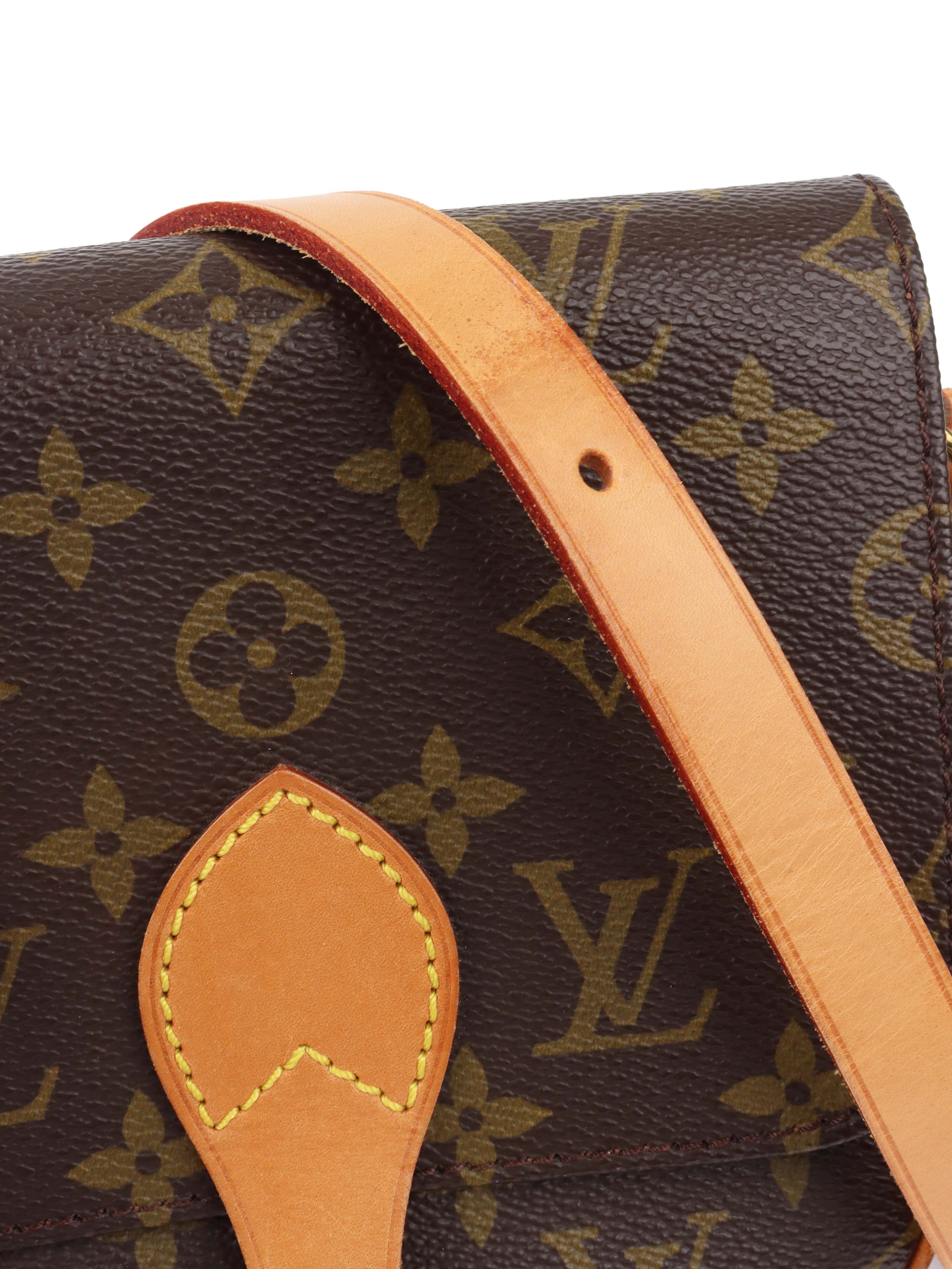 Louis Vuitton Monogram Cartouchiere PM Bag.