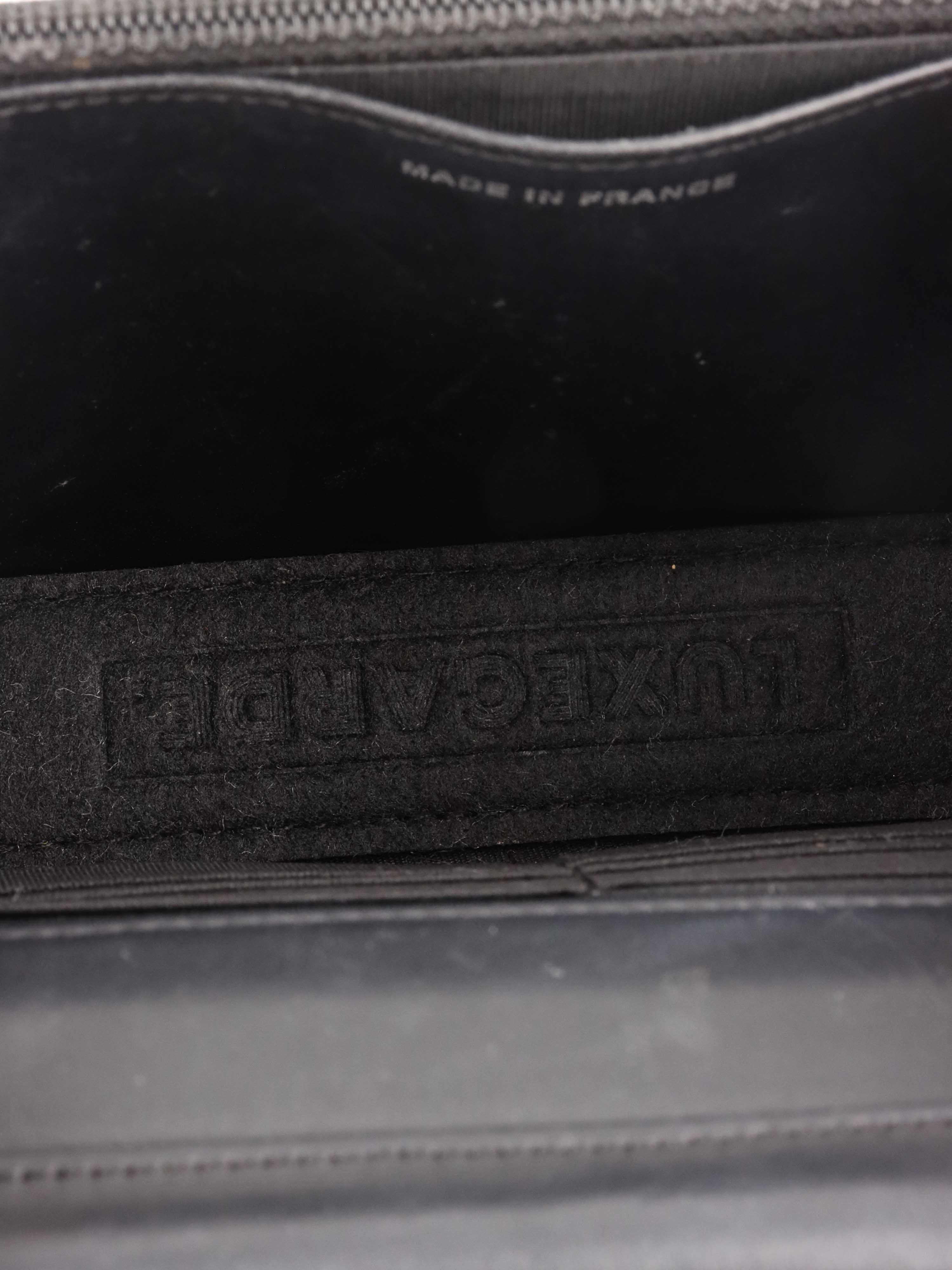 Chanel Black Caviar Wallet on Chain.