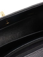 Chanel Black Mini Caviar Square Flap Bag.