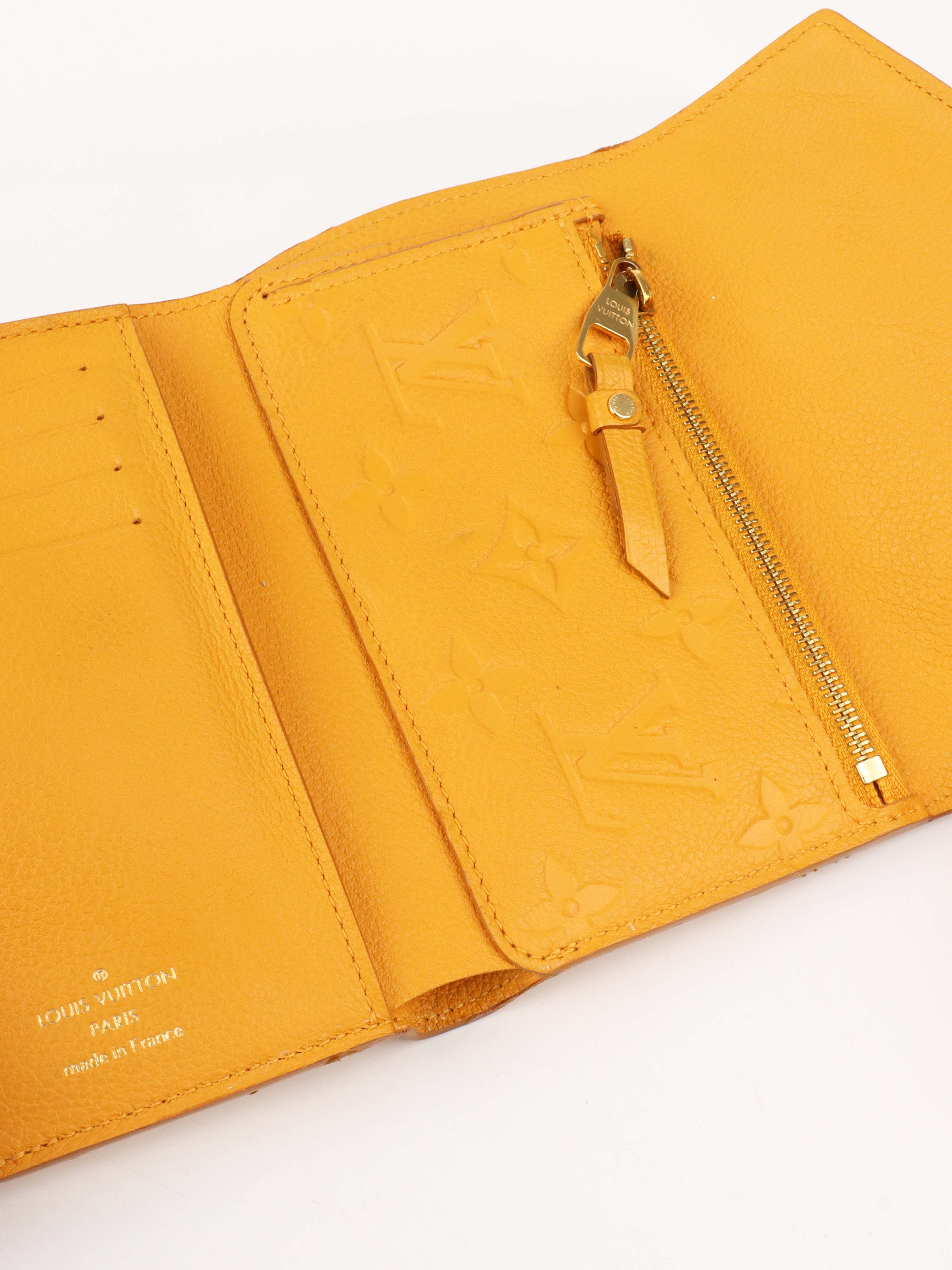 Louis Vuitton Saffran Empreinte Leather Compact Wallet.