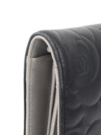 Chanel Black Camellia Wallet.